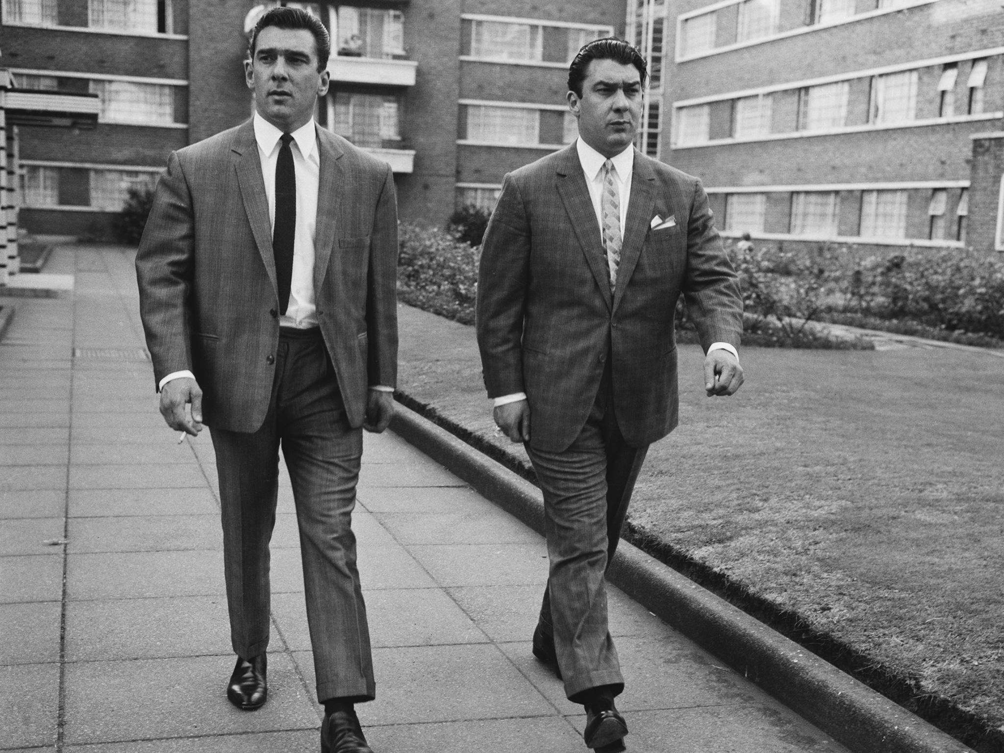 Twin brothers and organised crime bosses Ronnie and Reggie Kray in Cedra Court, off Cazenove Road in northeast London, 3 August 1964.