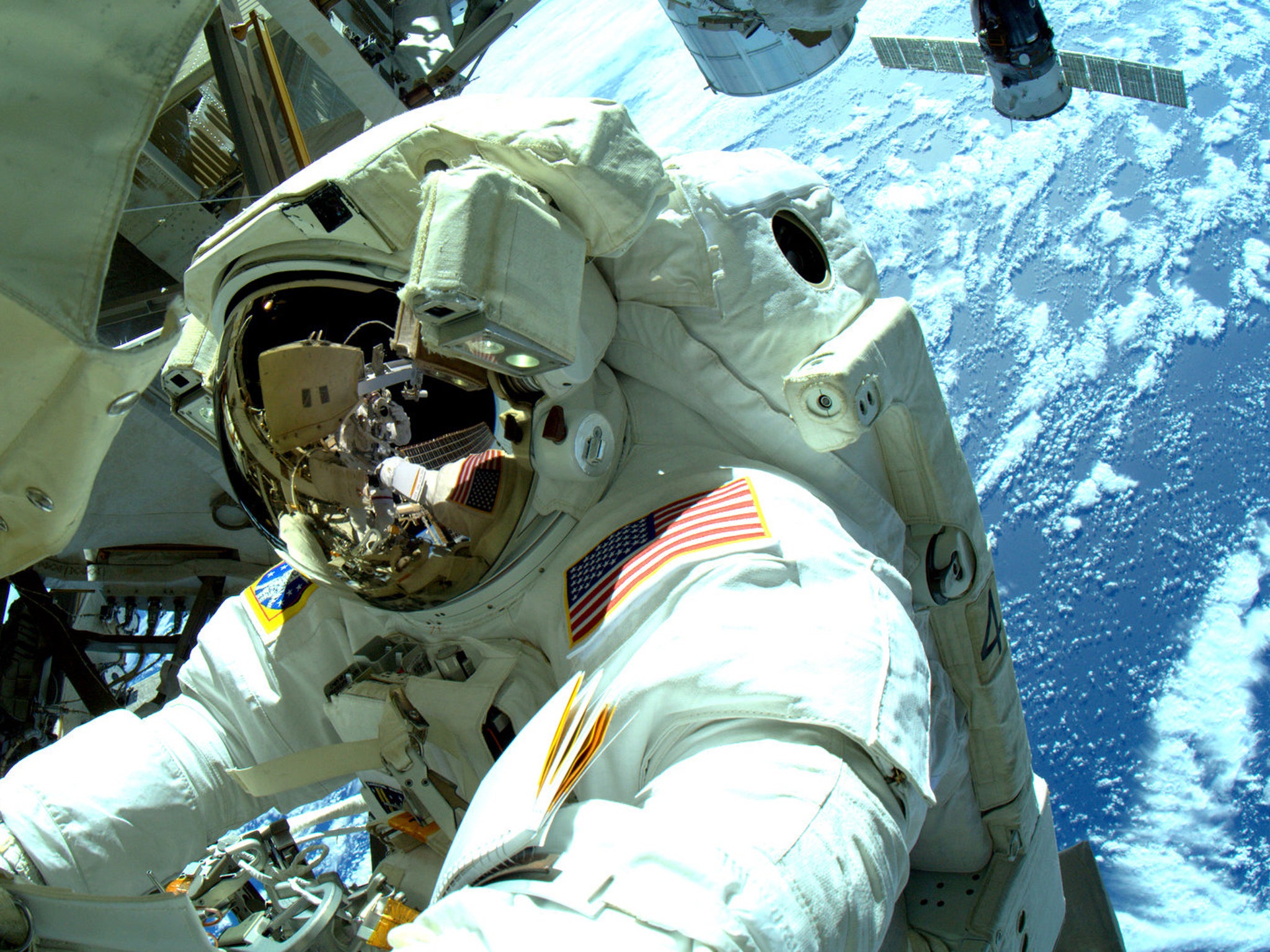 In this handout from National Aeronautics and Space Administration or NASA, Expedition 42 Flight Engineer Terry Virts and Commander Barry 'Butch' Wilmore work outside the International Space Station (ISS) on their third spacewalk March 1, 2015 in space