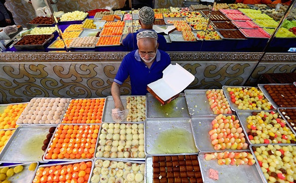 A man sells sweets ahead of Eid celebrations this week in Dubai