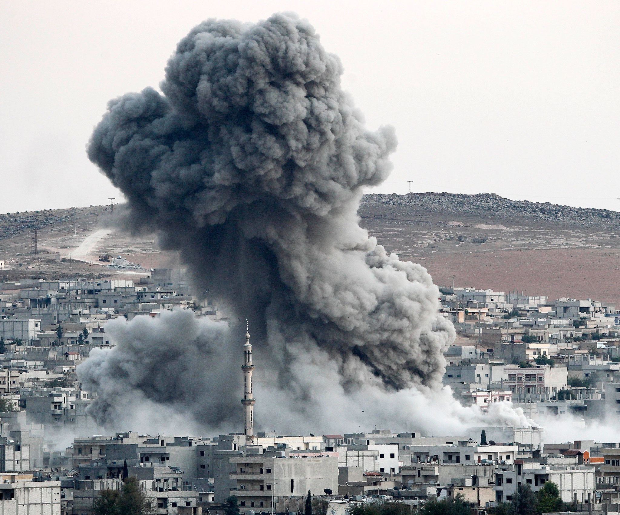 Heavy smoke rises following an airstrike by the US-led coalition aircraft in Kobani, Syria