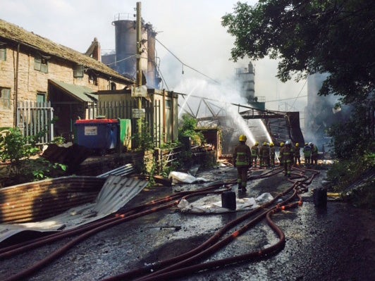 Firefighters continue to tackle blaze at site of Wood Flour Mills explosion in Cheshire, where four remain missing