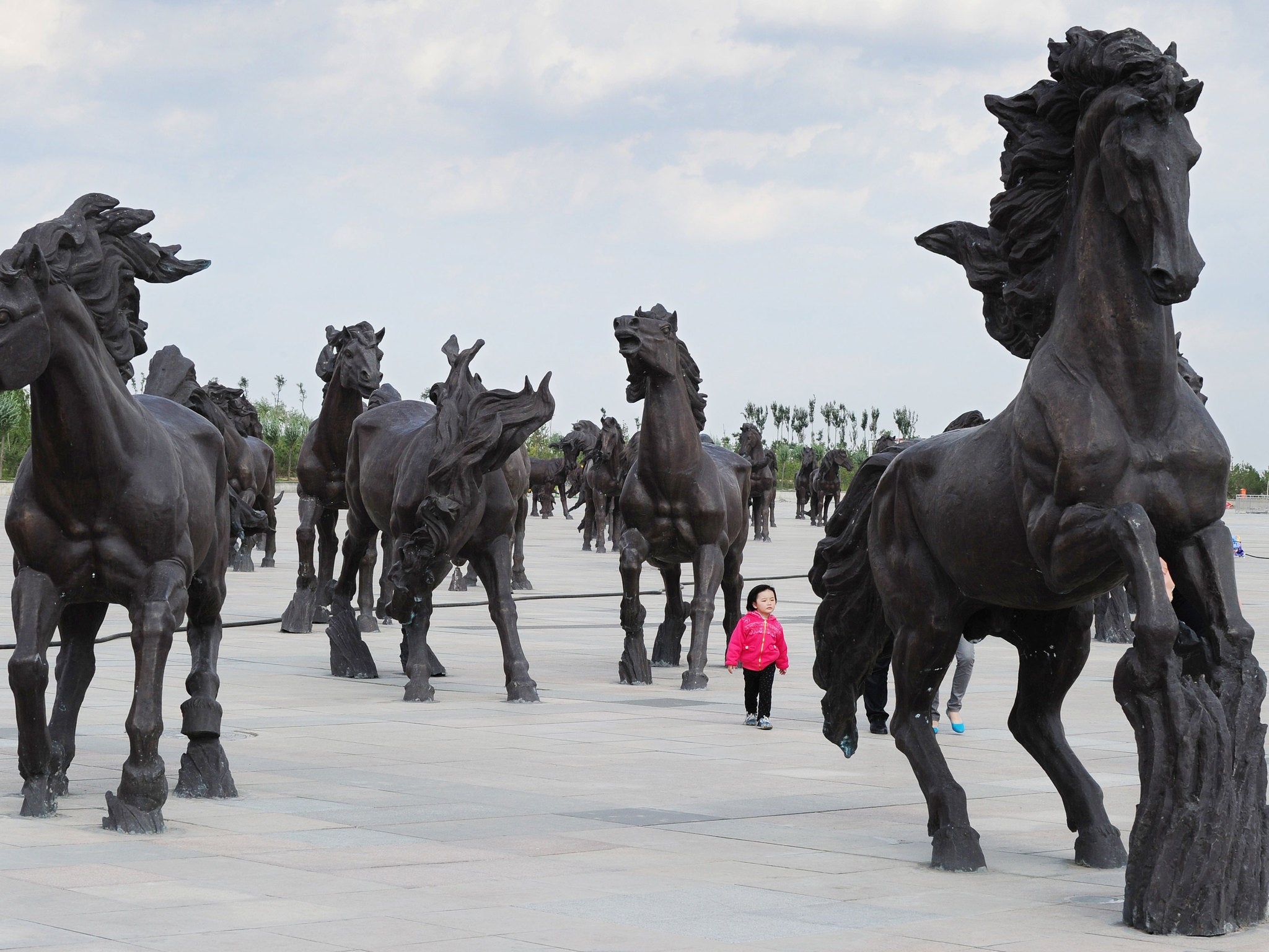 The group were visiting Genghis Khan's mausoleum in Ordos, Inner Mongolia