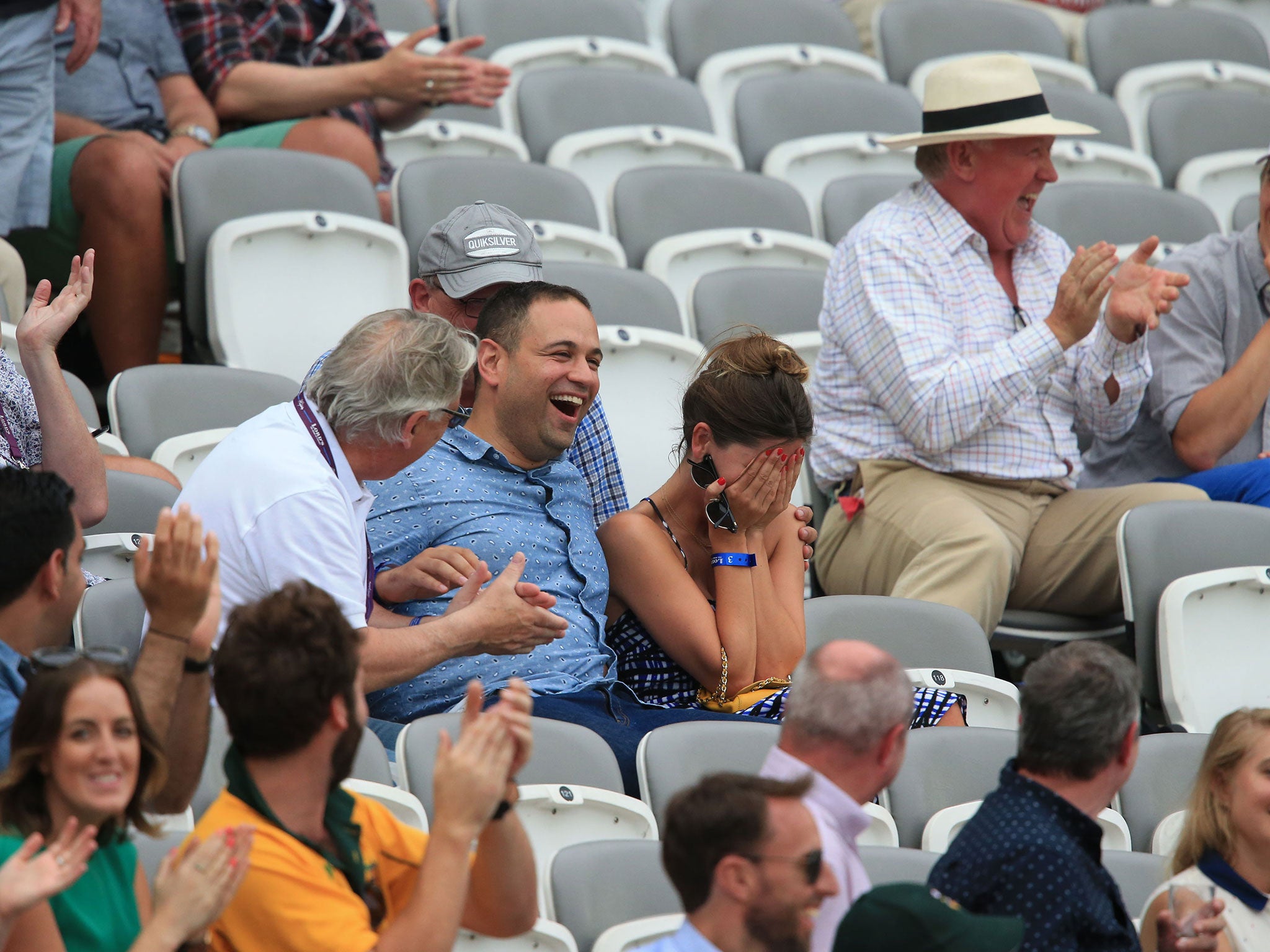 The woman sits with her head in her hands in embarrassment