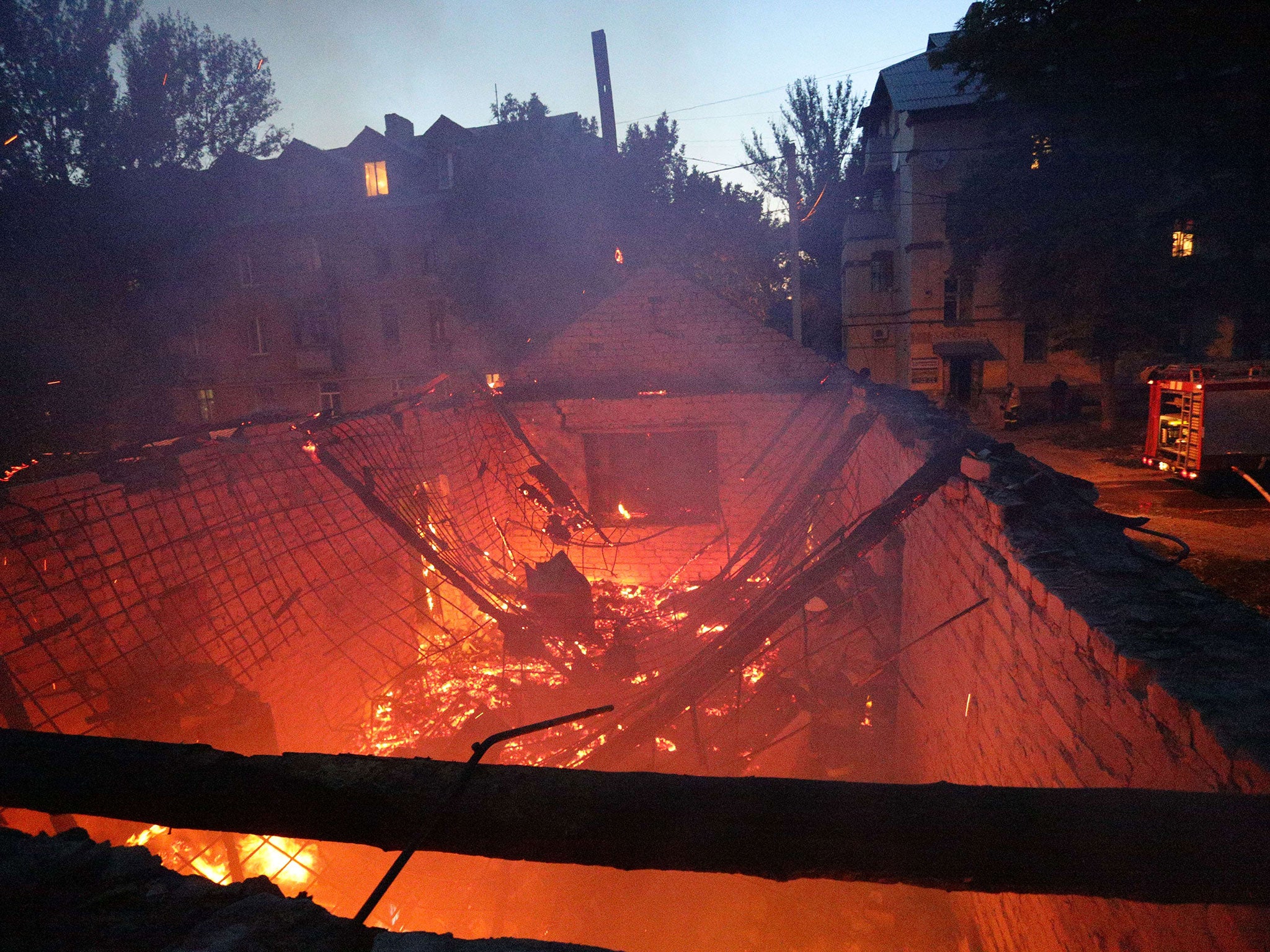 A building burns after the shelling between Ukrainian forces and pro-Russian separatists in the eastern Ukrainian city of Donetsk