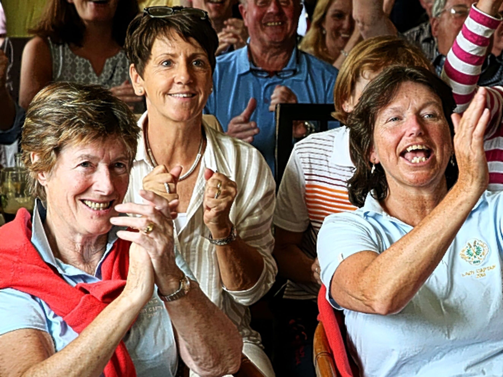 Greystones Golf Club members cheer as Paul Dunne birdies the fifth hole during yesterday’s final round at St Andrews