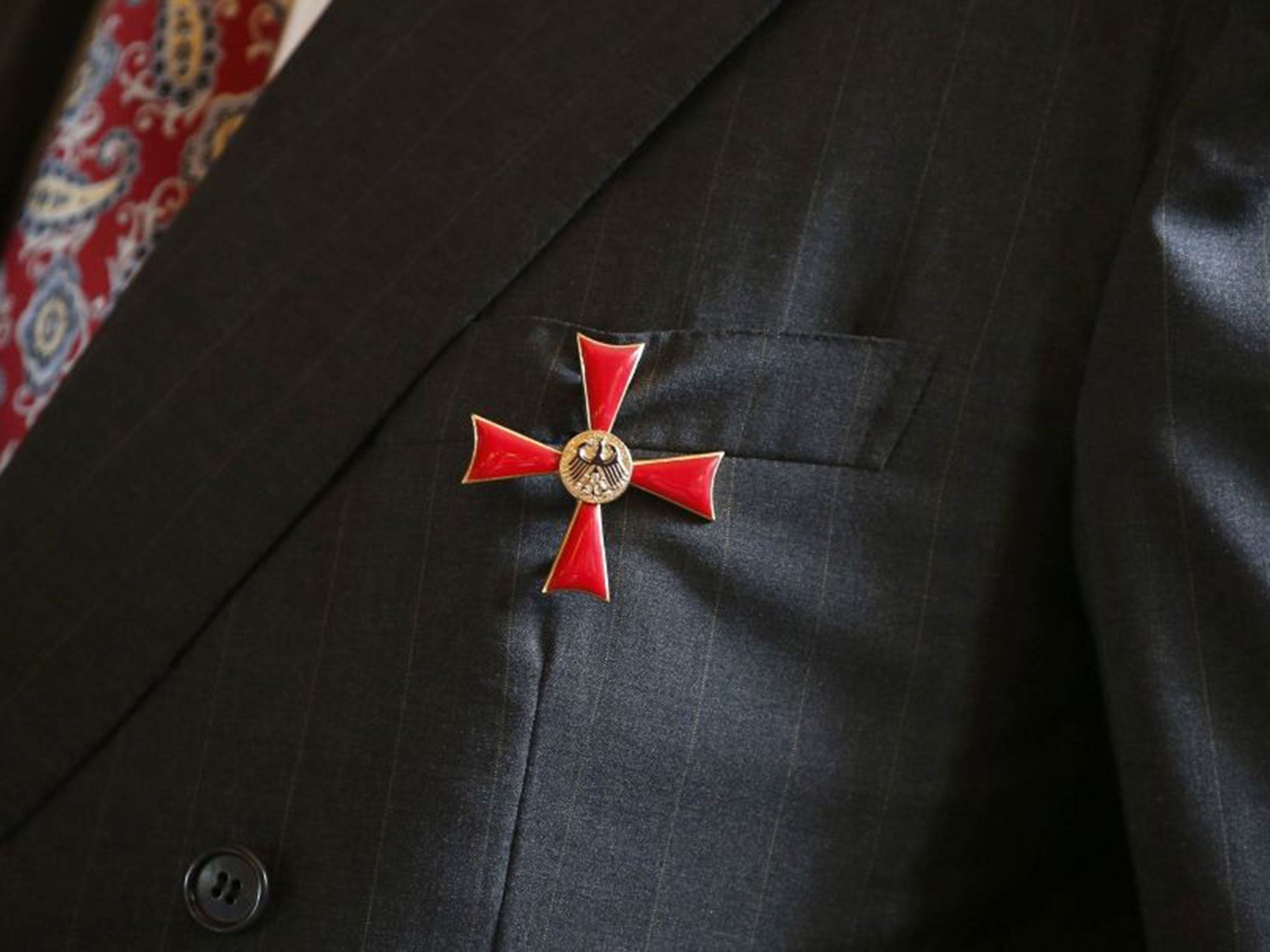 Nazi hunter Serge Klarsfeld wears the Federal Cross of Merit (Image: Reuters)