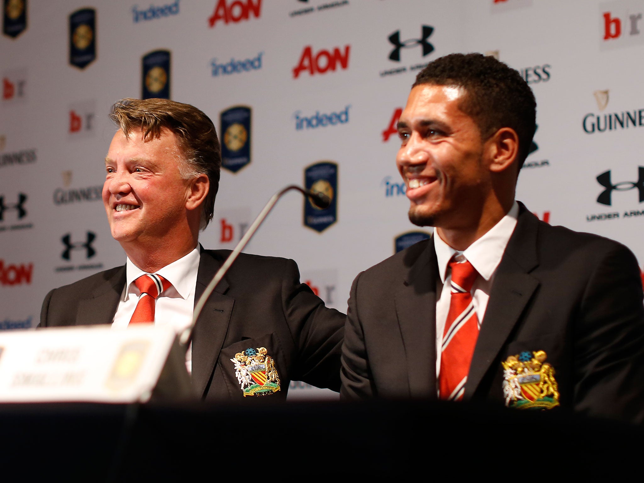 Louis van Gaal alongside Chris Smalling