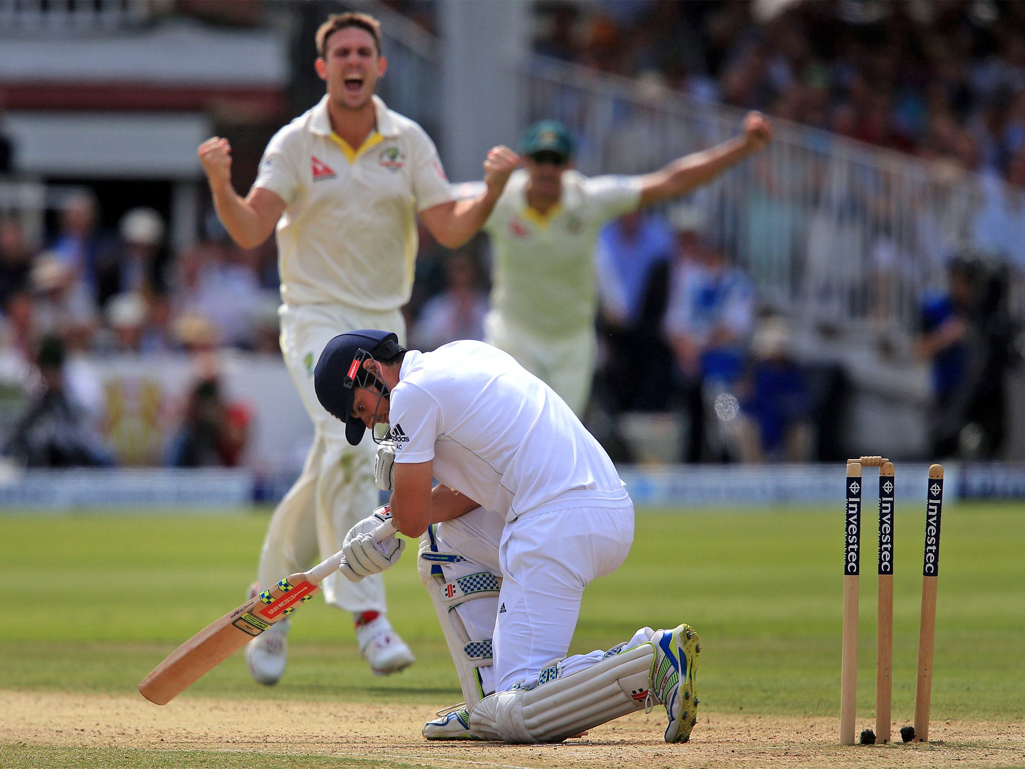 Mitchell Marsh celebrates bowling England captain Alastair Cook on day three at Lord’s