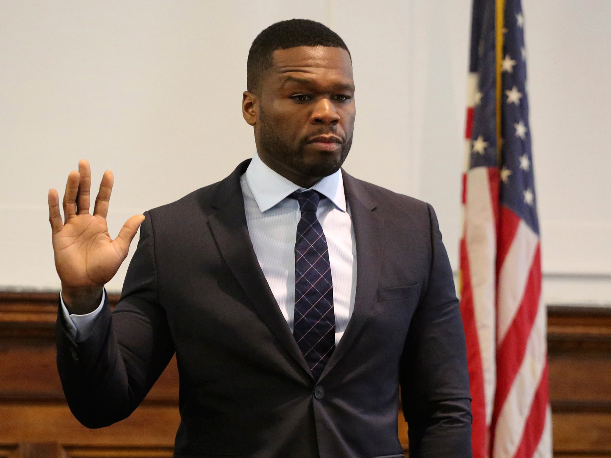 Rapper 50 Cent takes the oath as he appears in New York State Supreme Court in Manhattan, testifying in a lawsuit for a sex tape that was posted online. He recently filed for bankruptcy protection, reporting debts and assets in the range of $10 million to $50 million and called the voluntary Chapter 11 filing in a Connecticut bankruptcy court a "strategic business move" that would not affect fans