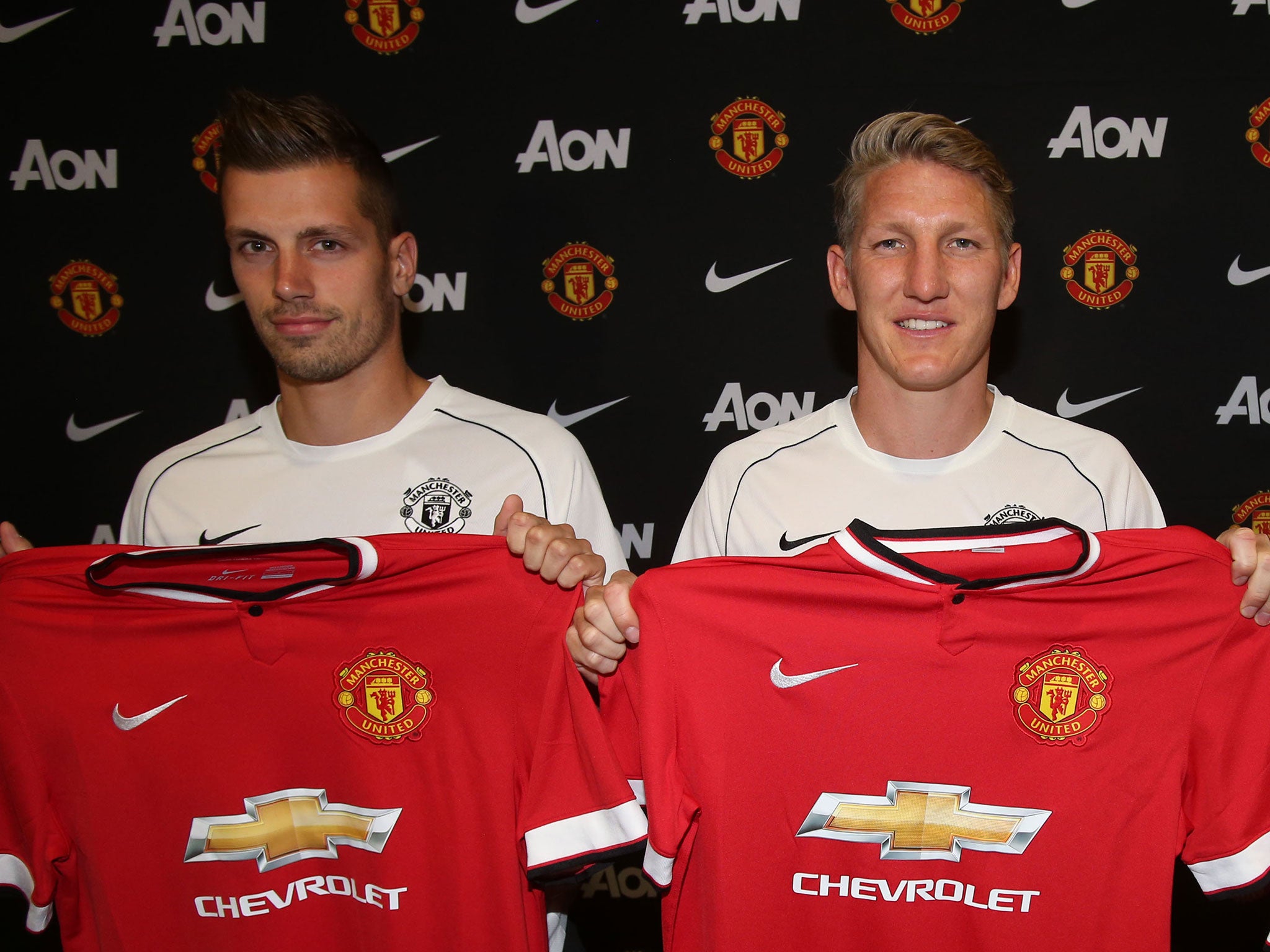 Morgan Schneiderlin and Bastian Schweinsteiger during United unveiling