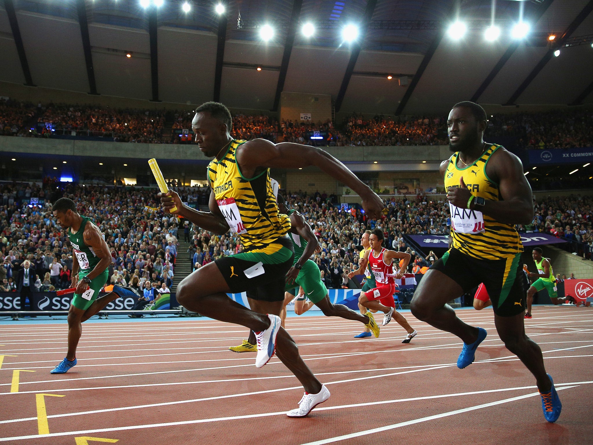 Usain Bolt running Jamaica to gold in the Men's 100m relay (Getty)