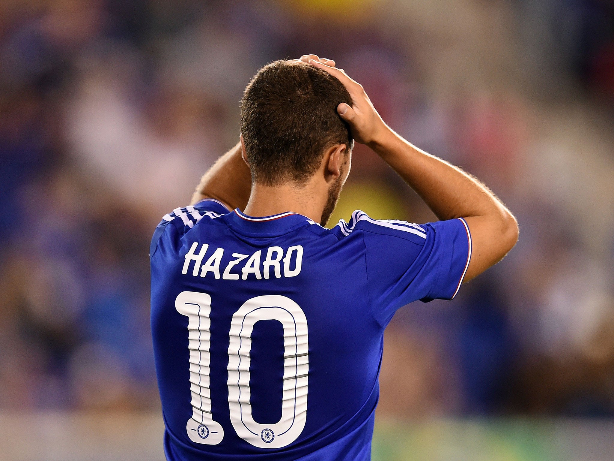 Eden Hazard reacts after Chelsea concede a goal