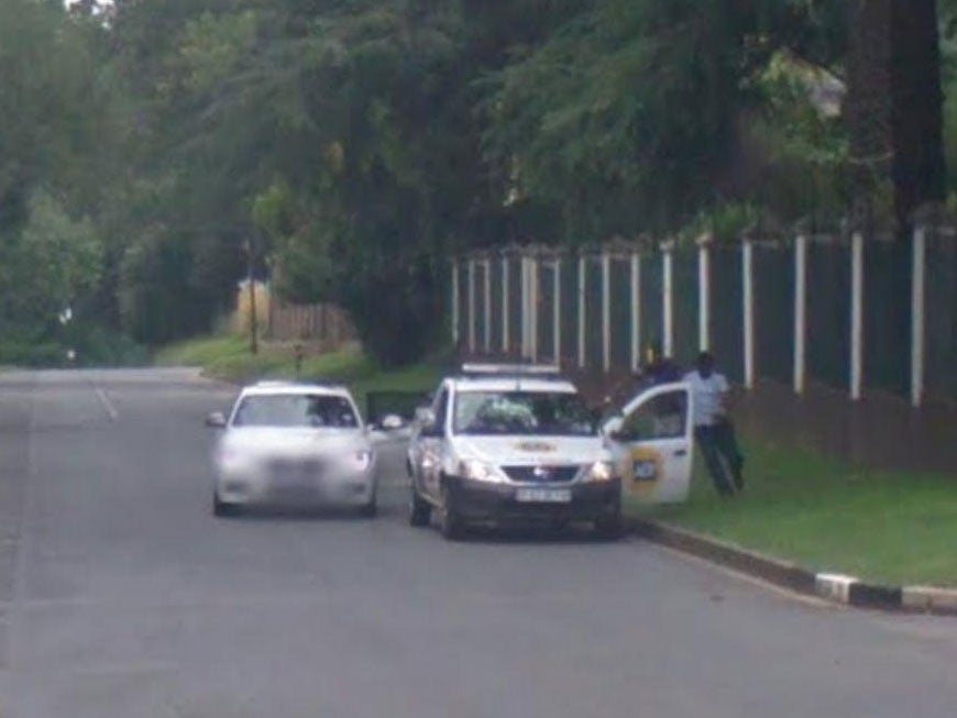 The robbers could be seen running over to their victim in the distance as the Google car approached