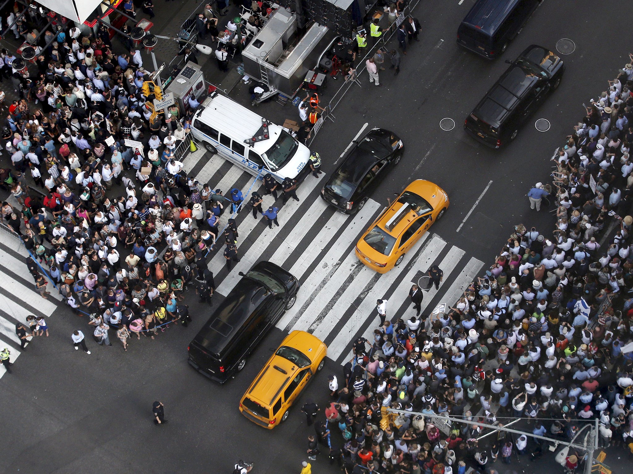 Some of several thousand protestors crowd into 7th Avenue at 42nd street as they demonstrate during a rally apposing the nuclear deal with Iran