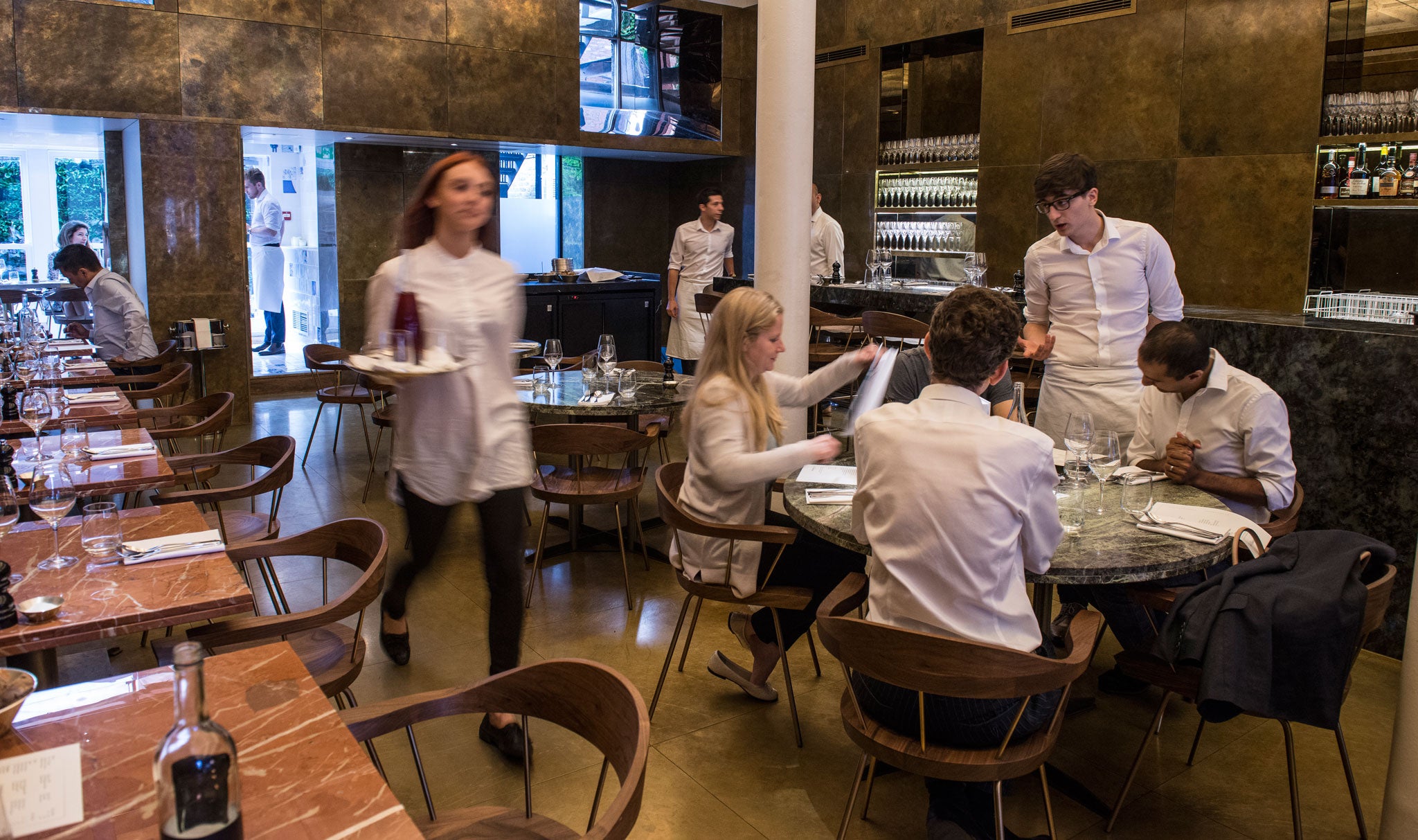 Le Chabanais is a long slim room lined entirely in foxed, patinated brass, like a safety deposit box forged from old gold