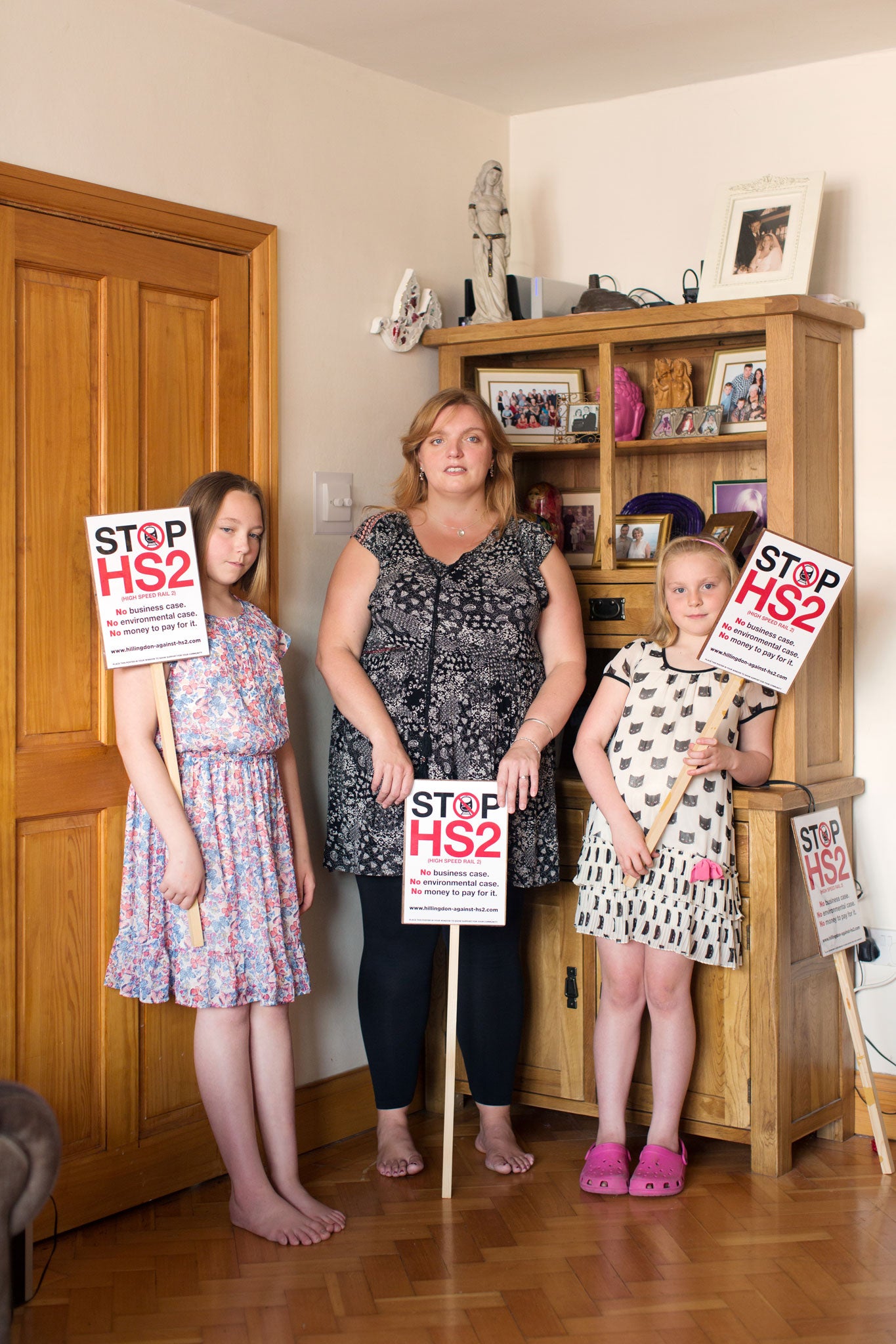 Keri Brennan with her daughters, Caitlin (left) and Sian. 'It's like I'm a lioness and I'm protecting them,' she says