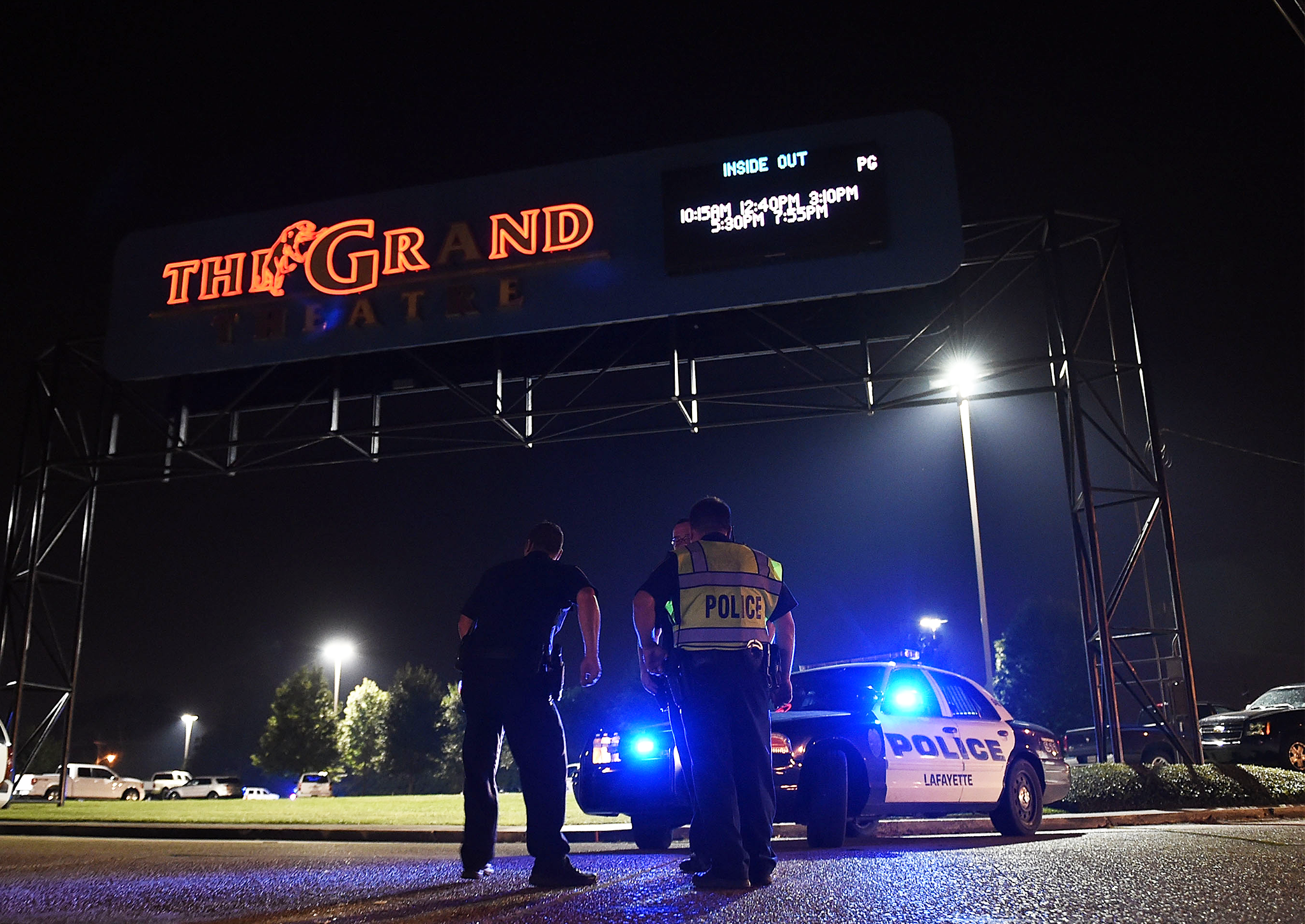 Lafayette police stand outside of the Grand Theater on July 23, 2015 in Lafayette, Louisiana.