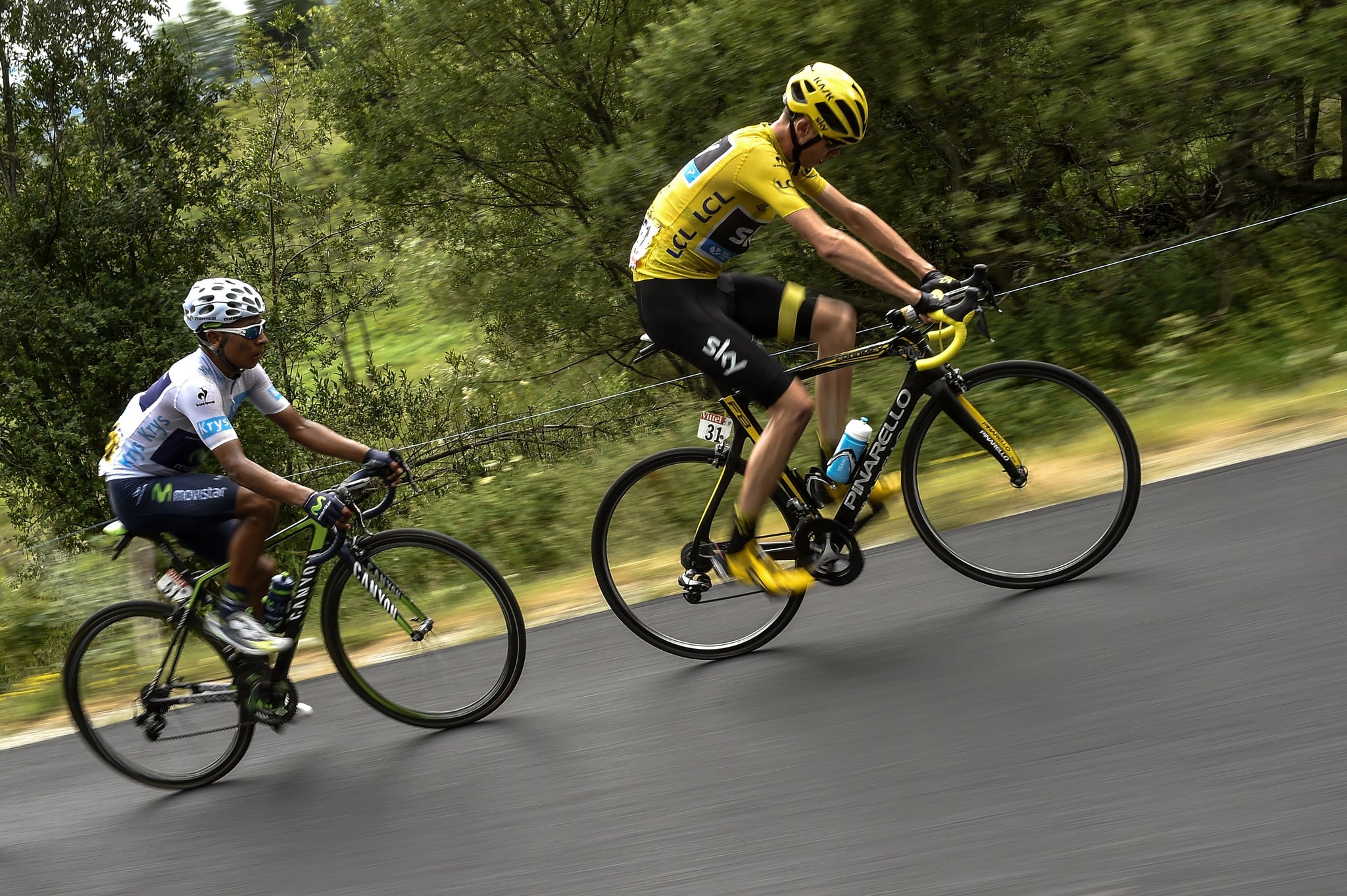 Chris Froome cycles ahead of Colombia's Nairo Quintana during Stage 19 of the Tour de France 2015