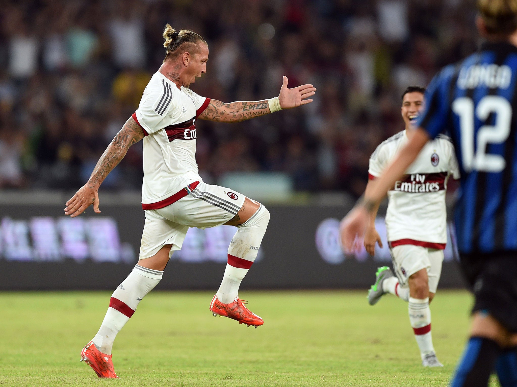 Philippe Mexes reacts after scoring a wonder-goal against Inter