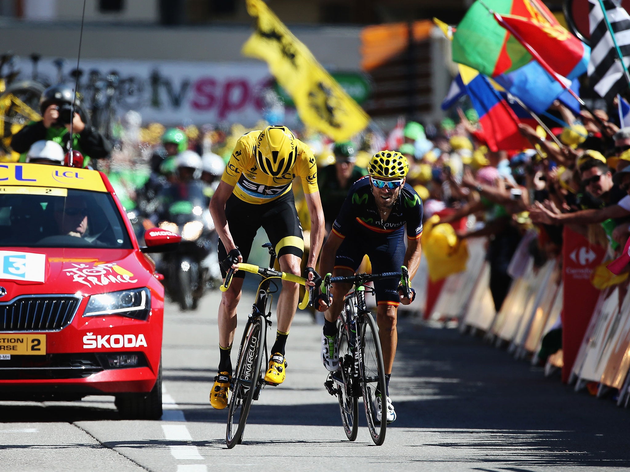 Chris Froome crosses the line on the penultimate stage of the 2015 Tour de France