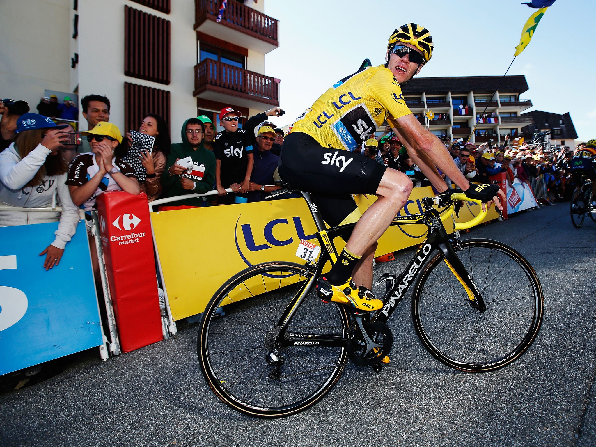 Froome looks back moments after crossing the line on the penultimate stage