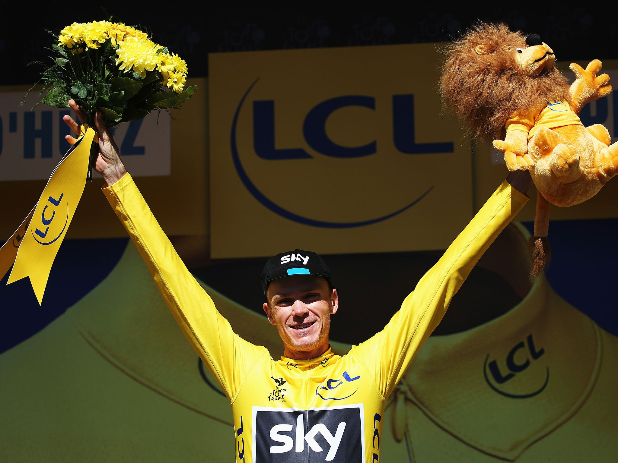 Chris Froome celebrates sealing his second Tour de France title