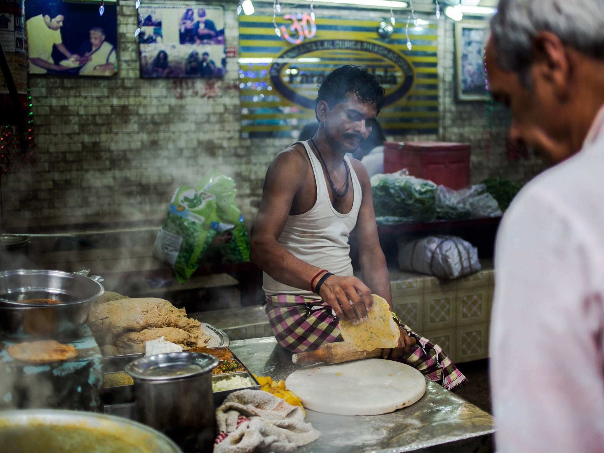 The hawkers serving up piping hot curries in Delhi fear a new scheme will tempt away their regular customers