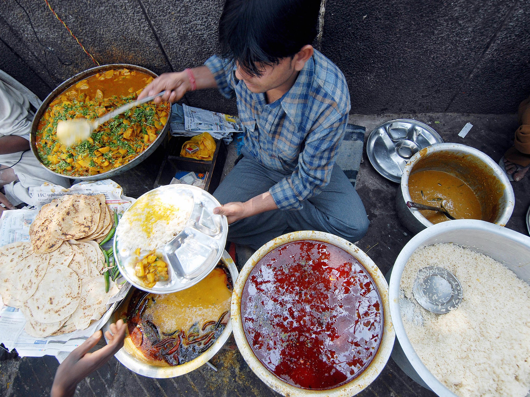 Vendors claim they are penalised by having to pay bribes (AFP/Getty)