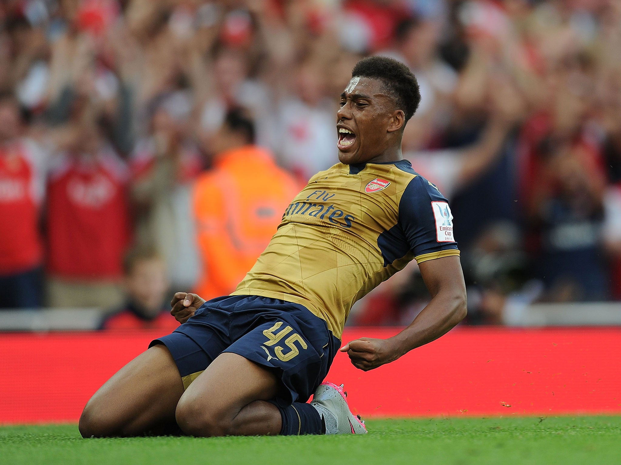 Alex Iwobi celebrates scoring his first goal for Arsenal