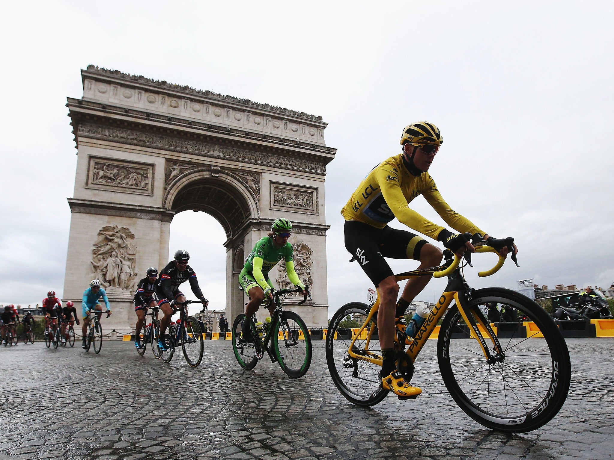 Chris Froome rides into Paris