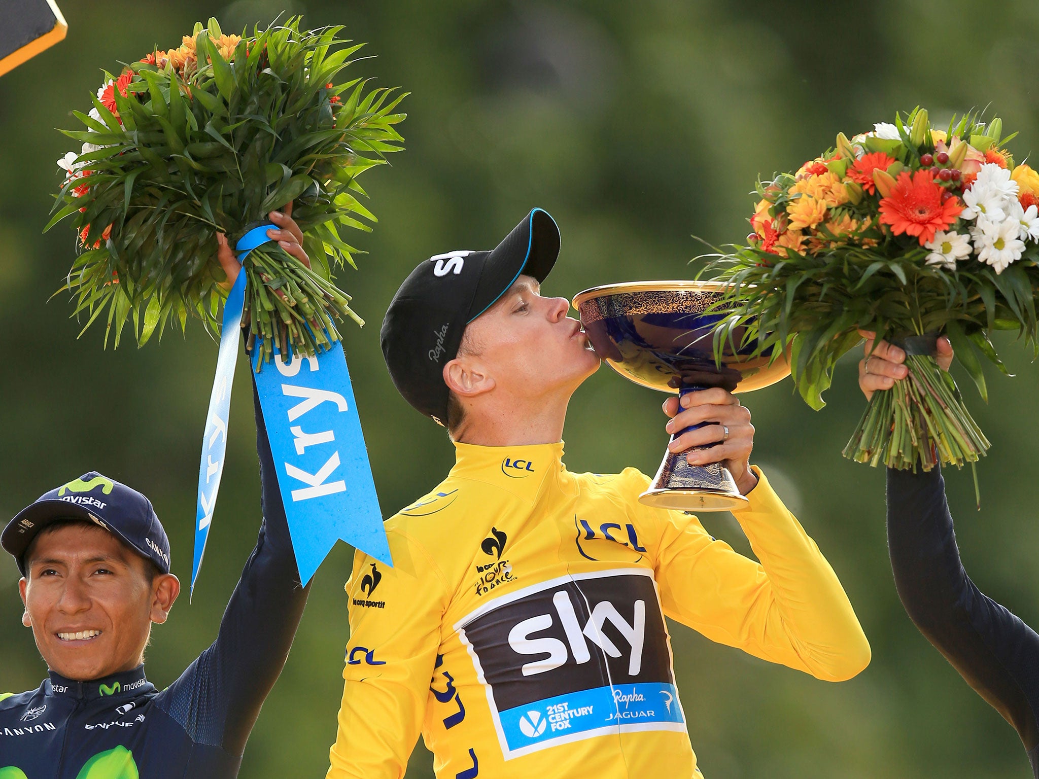 Team Sky's Chris Froome celebrates winning the 2015 Tour de France