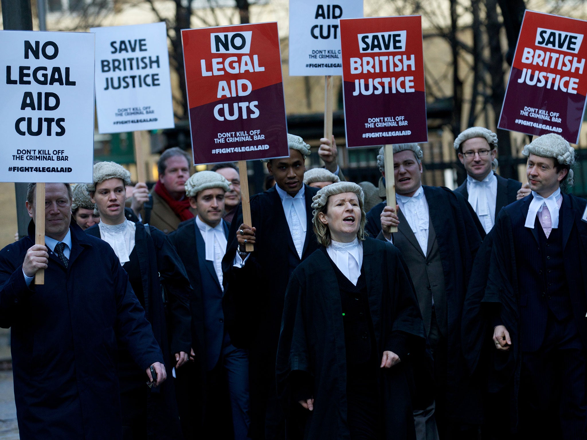 Lawyers have launched legal action and strikes over funding cuts