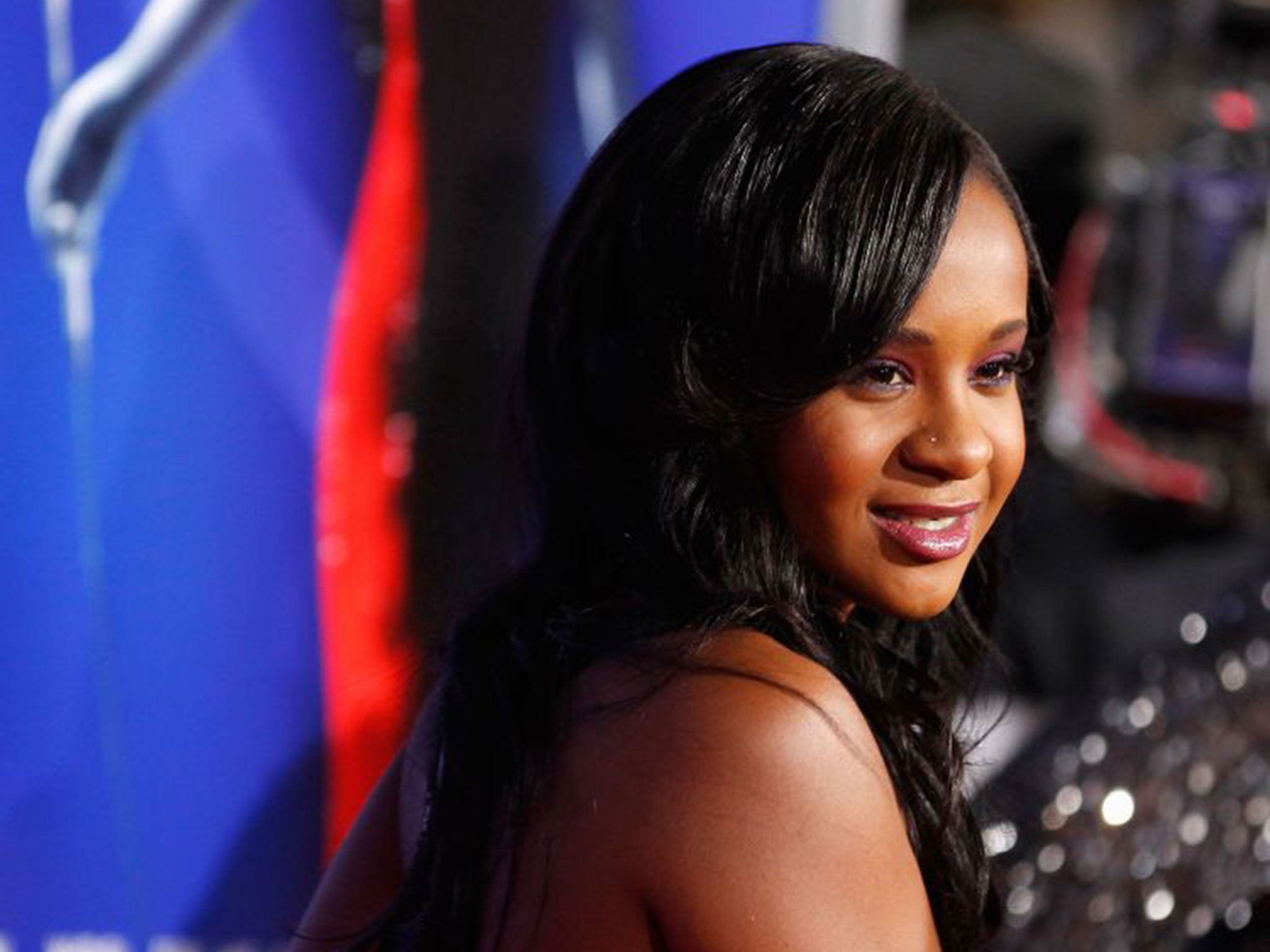 Bobbi Kristina Brown, daughter of the late singer Whitney Houston, poses at the premiere of "Sparkle" in Hollywood