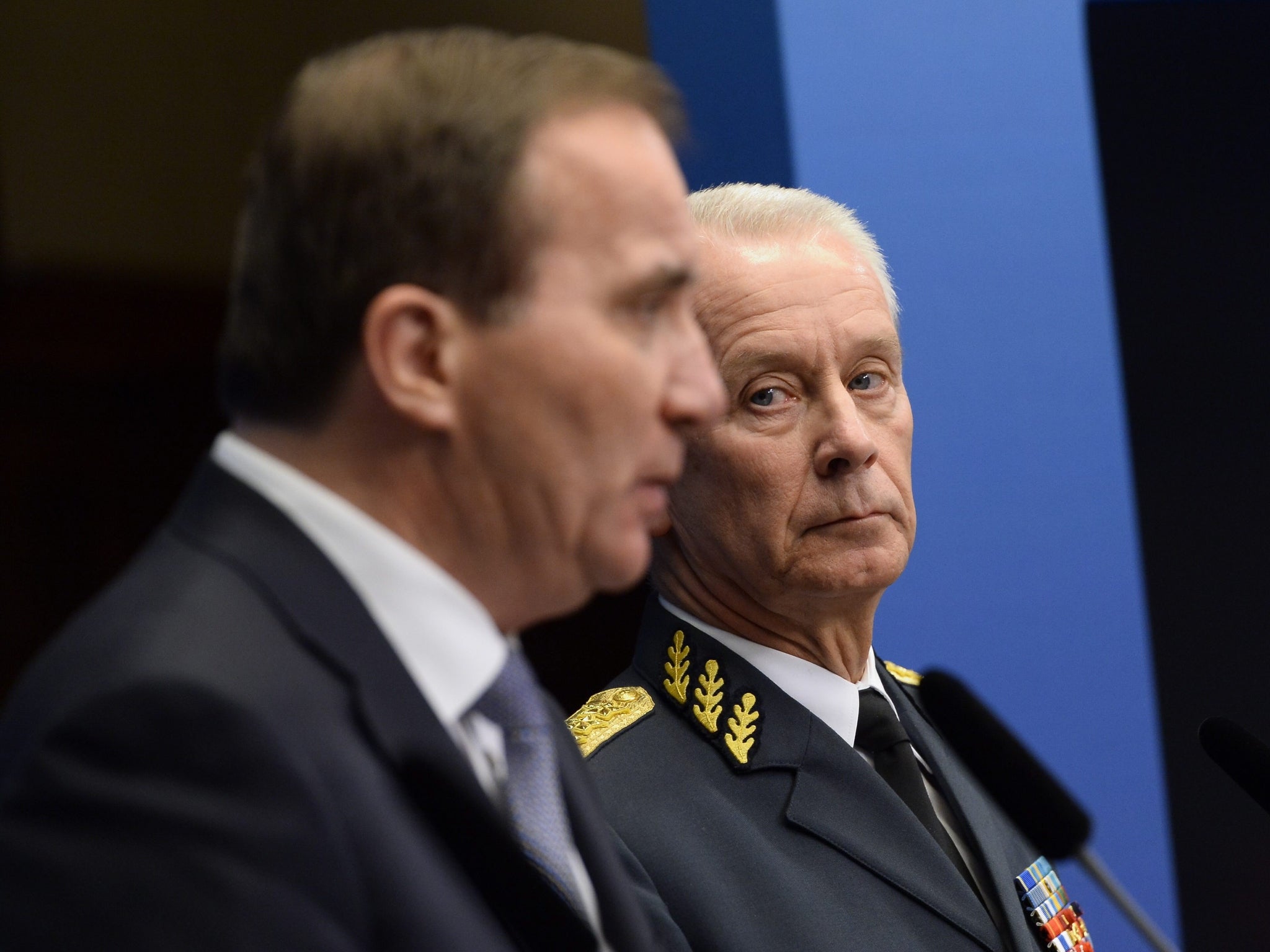 Sweden's prime minister Stefan Loefven and Supreme Commander of the Swedish Armed Forces Sverker Goeransson speak to press during Sweden's 2014 submarine hunt