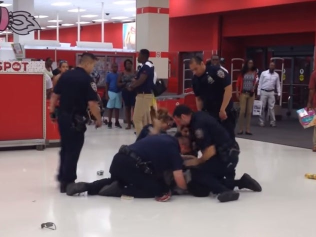 The moment when police officers started striking Alando Brissett