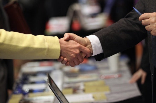 Graduates in the South East of England will receive an average salary of almost £27,000 as the West Midlands, East Midlands and North West show massive job growth (via John Moore/Getty Images)