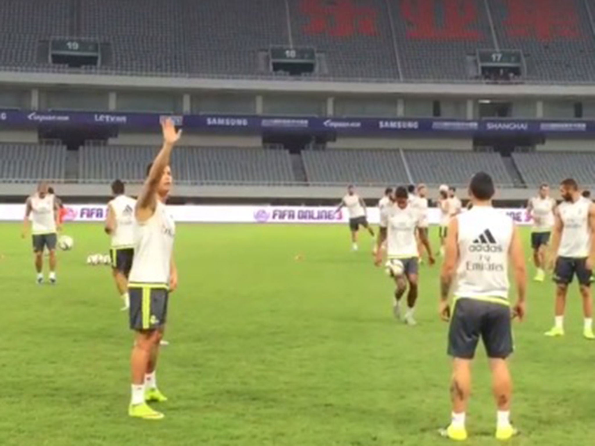 Cristiano Ronaldo waves to the crowd in Shanghai during his moment of skill