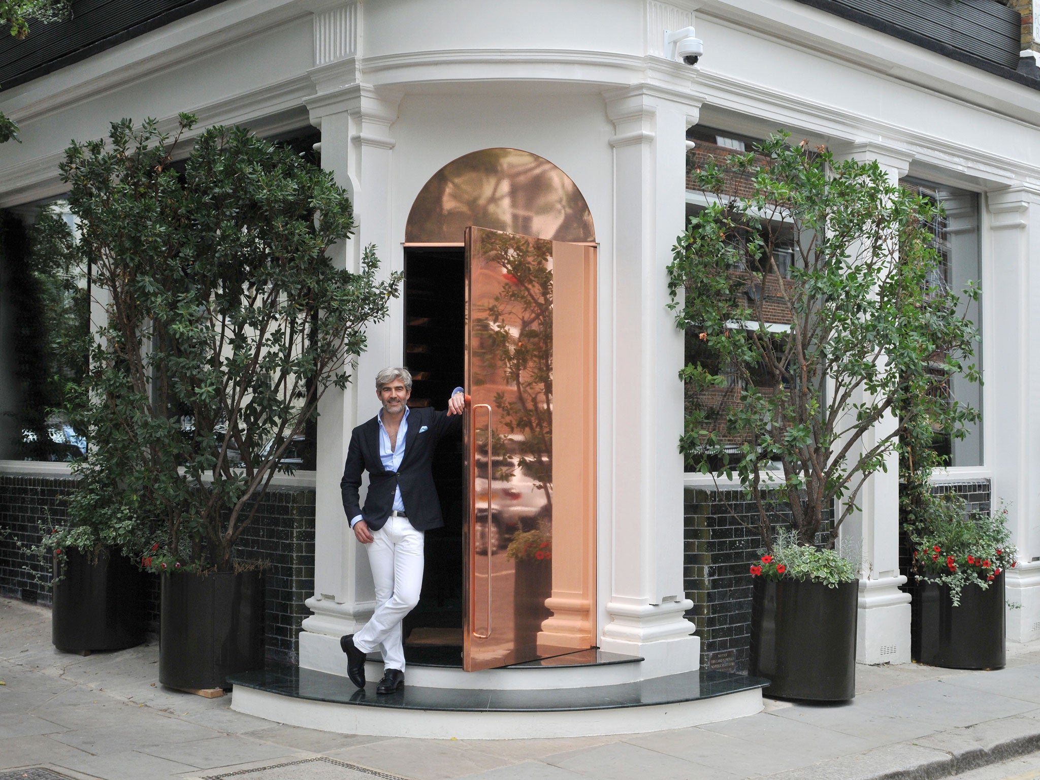 Juan Santa Cruz pictured outside his restaurant