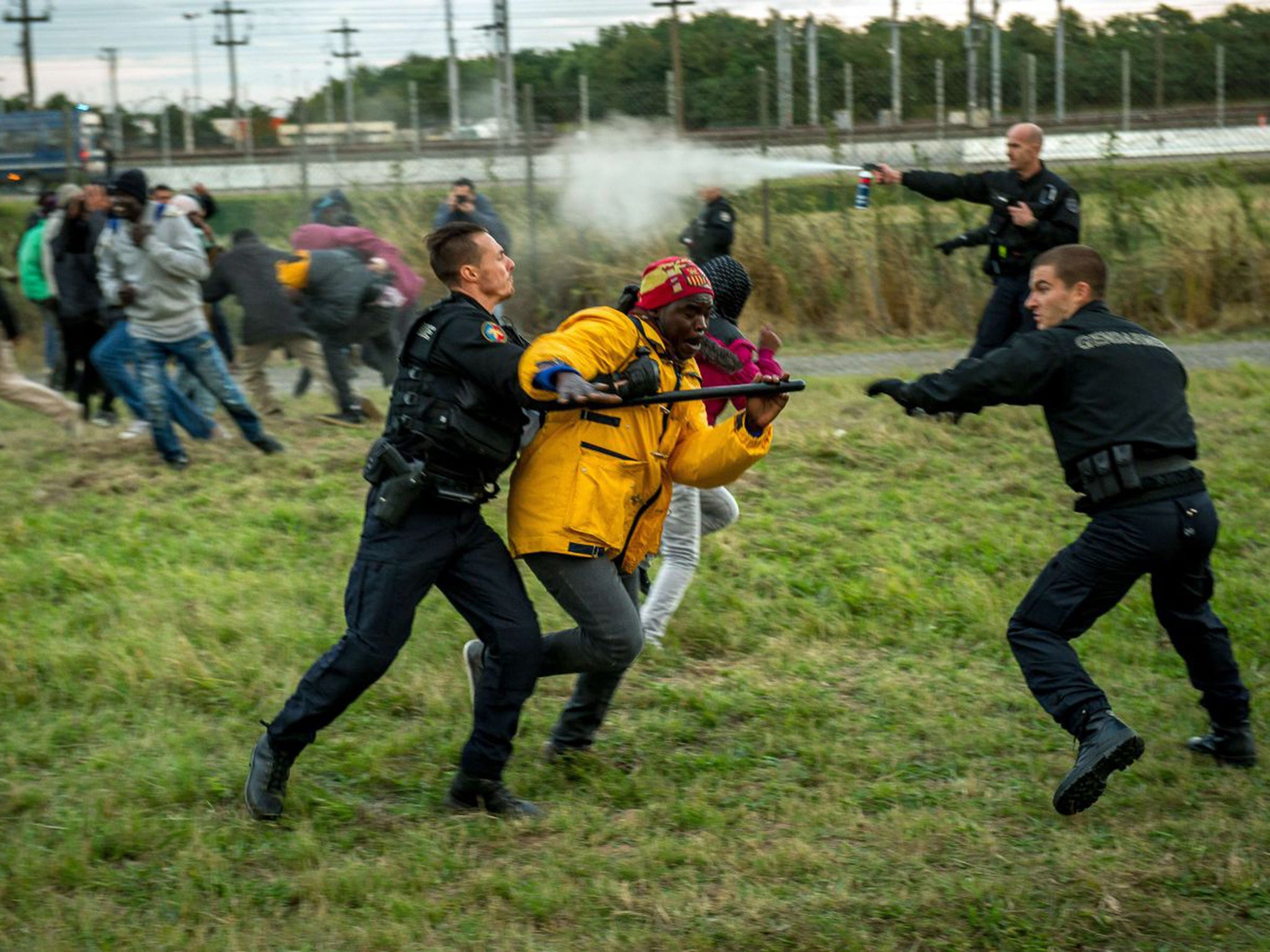 Authorities are being overwhelmed as they try to fight off hundreds of migrants, prompting France to beef up its police presence