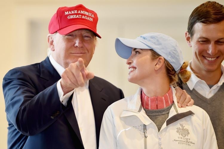 Trump and his daughter Ivanka (centre) visited his golf course at Turnberry for the Women's Open