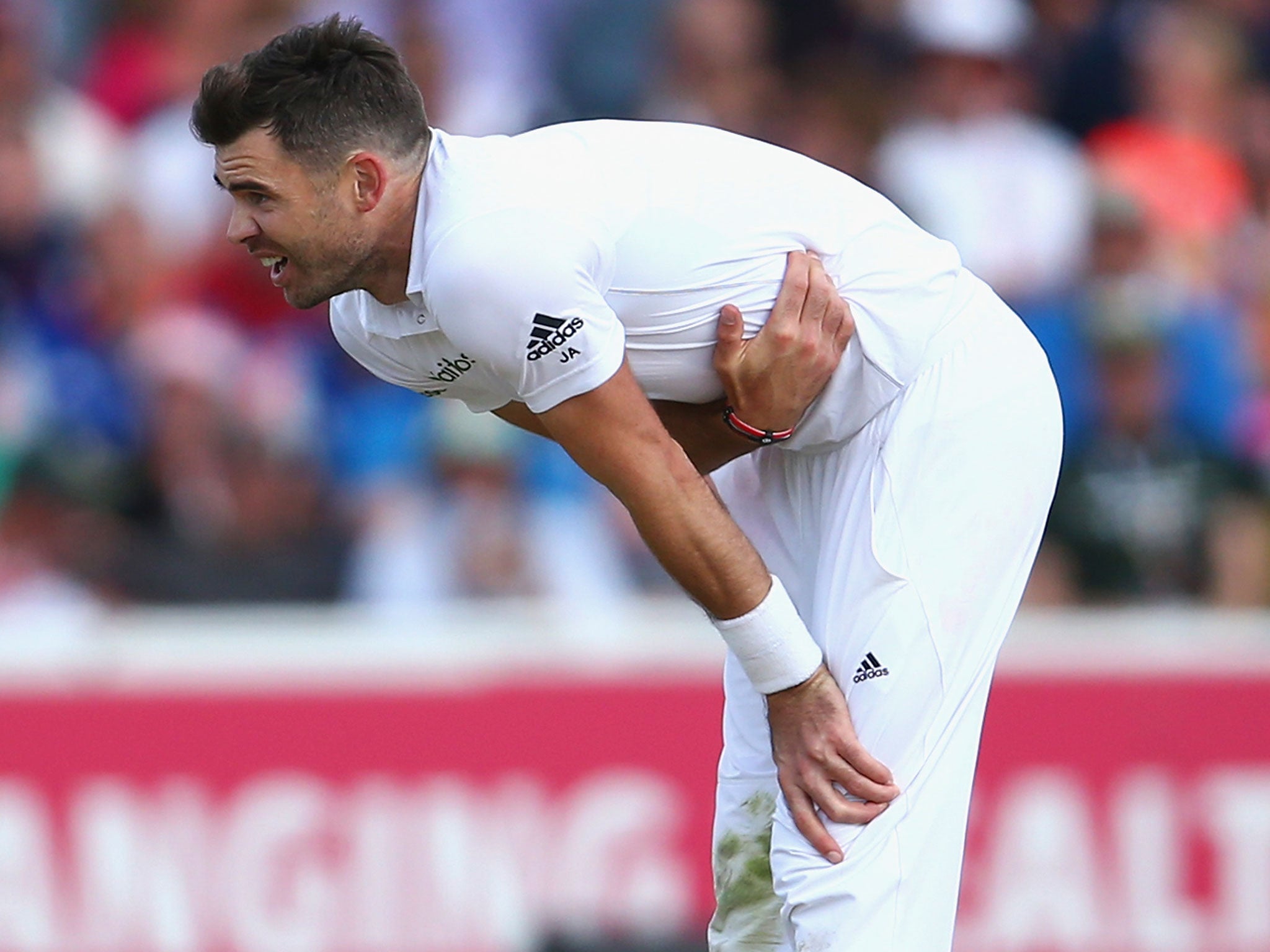 Anderson keels over in pain after hurting his side