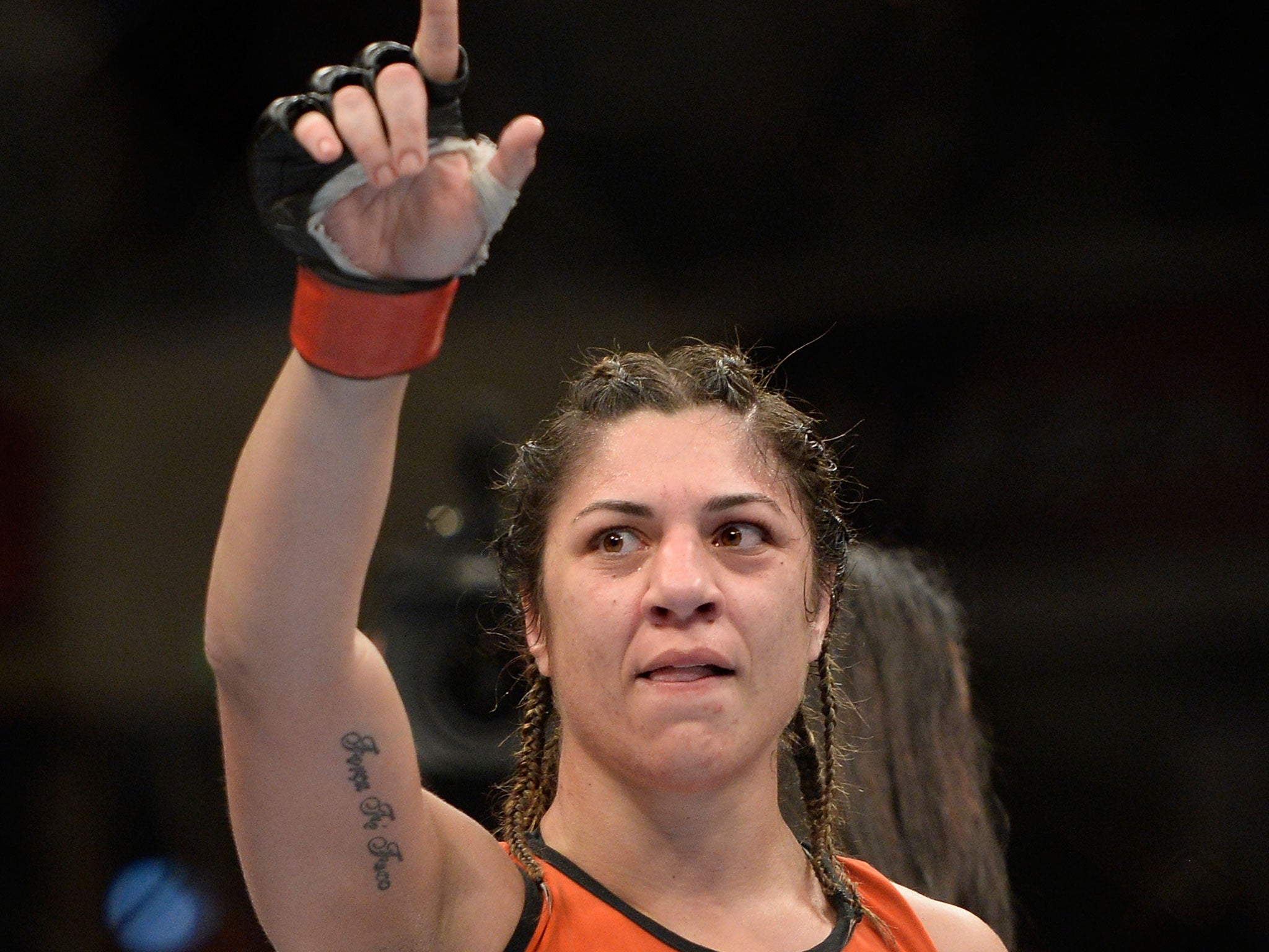 Bethe Correia celebrates after defeating Shayna Baszler