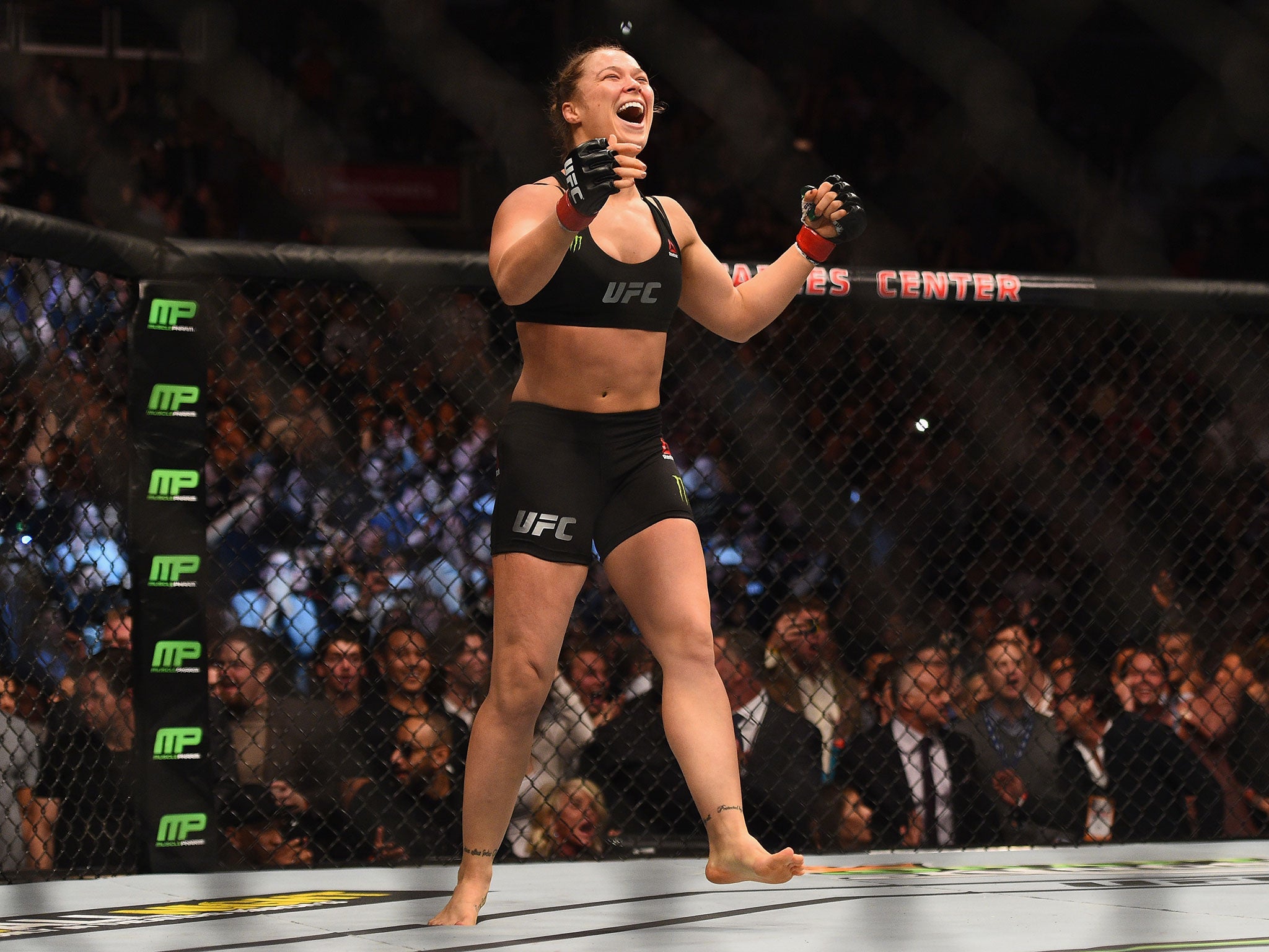 Ronda Rousey celebrates Zingano win