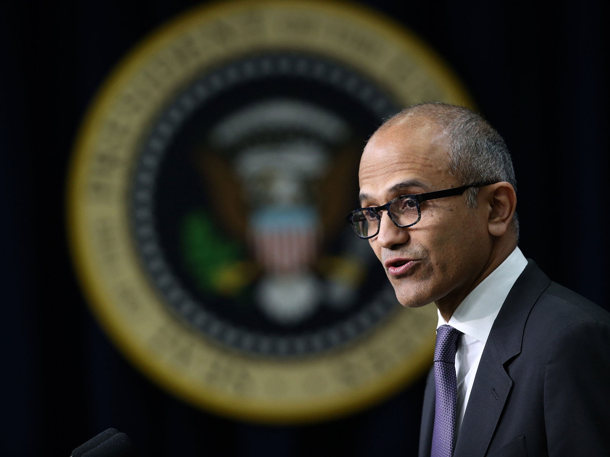 Satya Nadella, CEO of Microsoft, delivers remarks while introducing U.S. President Barack Obama at a Champions of Change event (Getty)