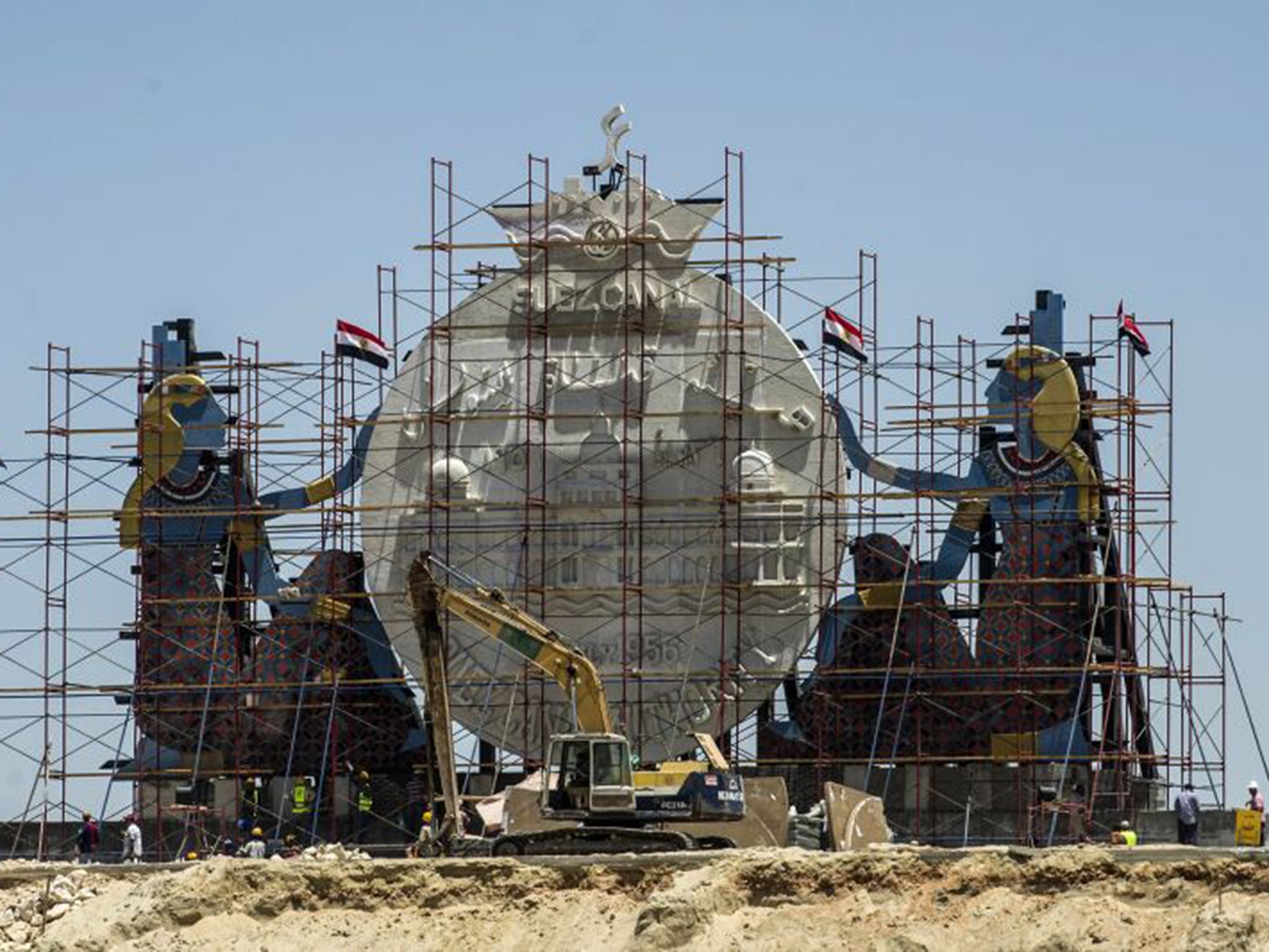 Various statues are being erected on the canal’s banks including Isis (the goddess of protection), a shiny silver metal globe and a 20ft-high rendering of a worker digging the soil