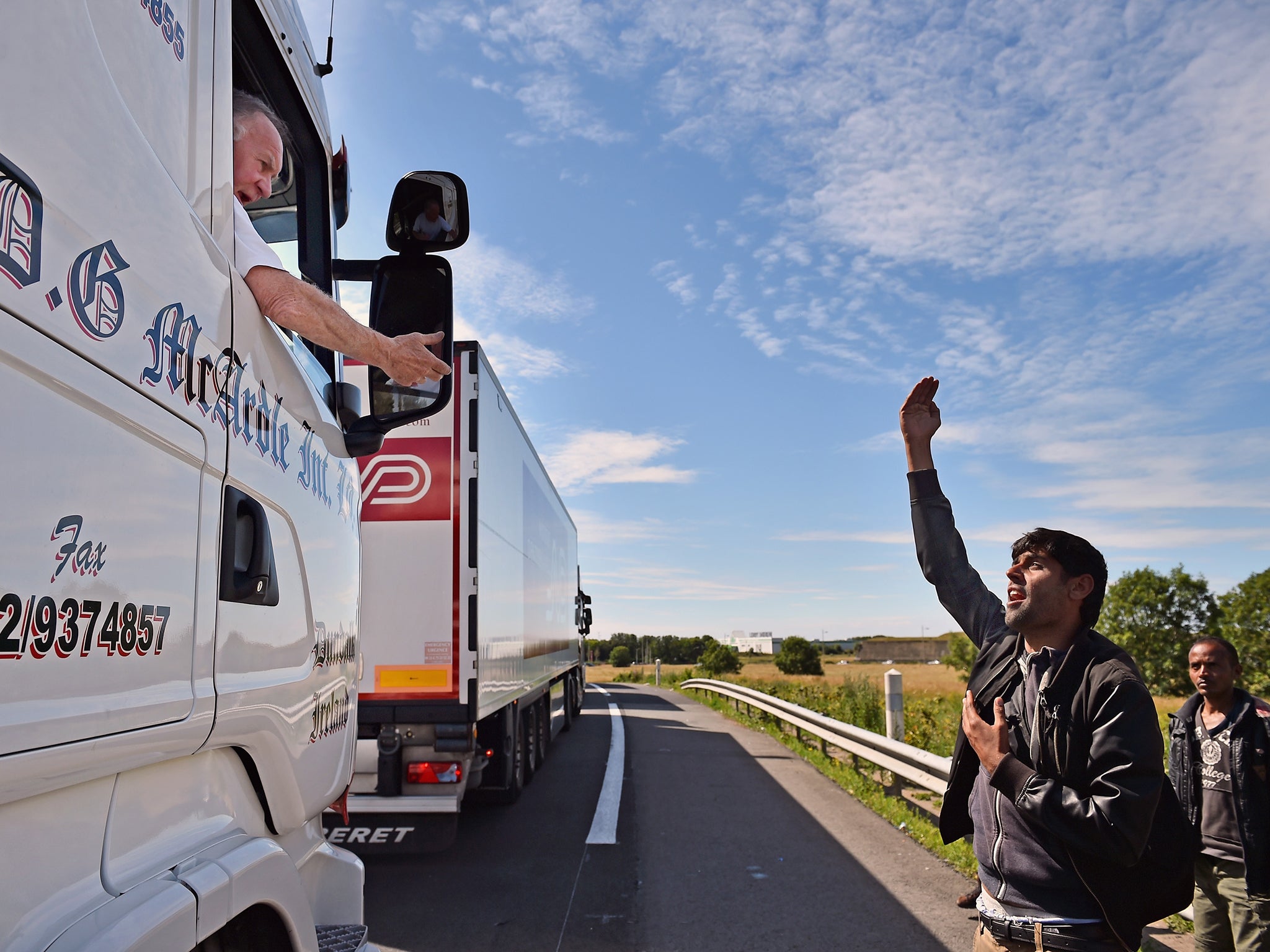 Slow-moving or stopped lorries are a sitting target for the many men and women who hope to hitch an illegal ride to England