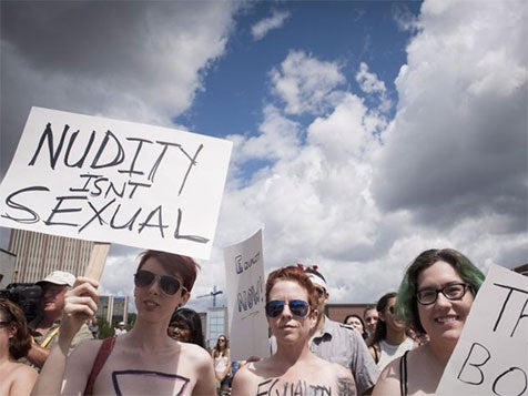 Demonstrators gathered for the 'Bare With Us' protest in Waterloo Town Square, Ontario, on 1 August