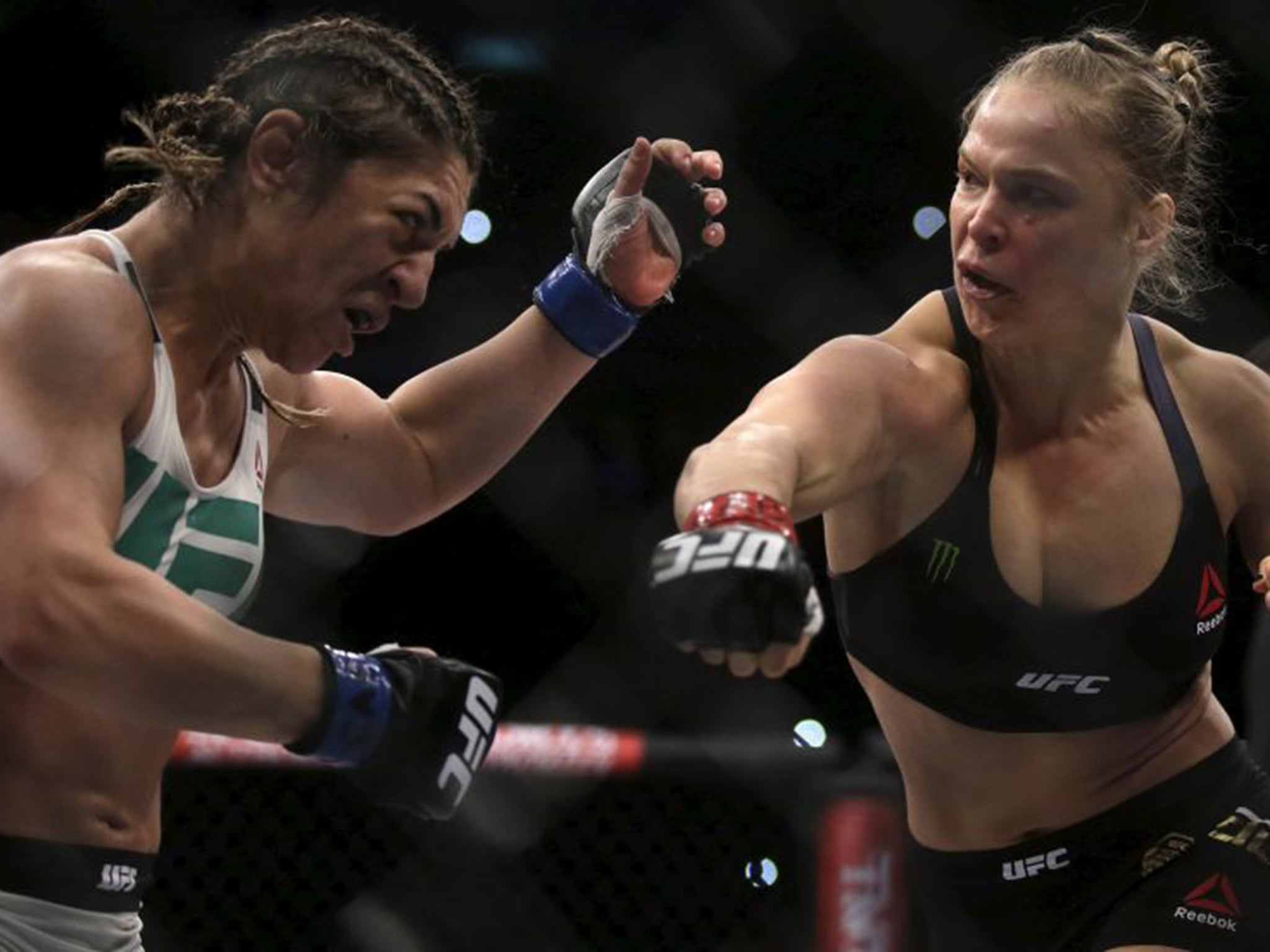 Rousey lands a punch on Bethe Correia