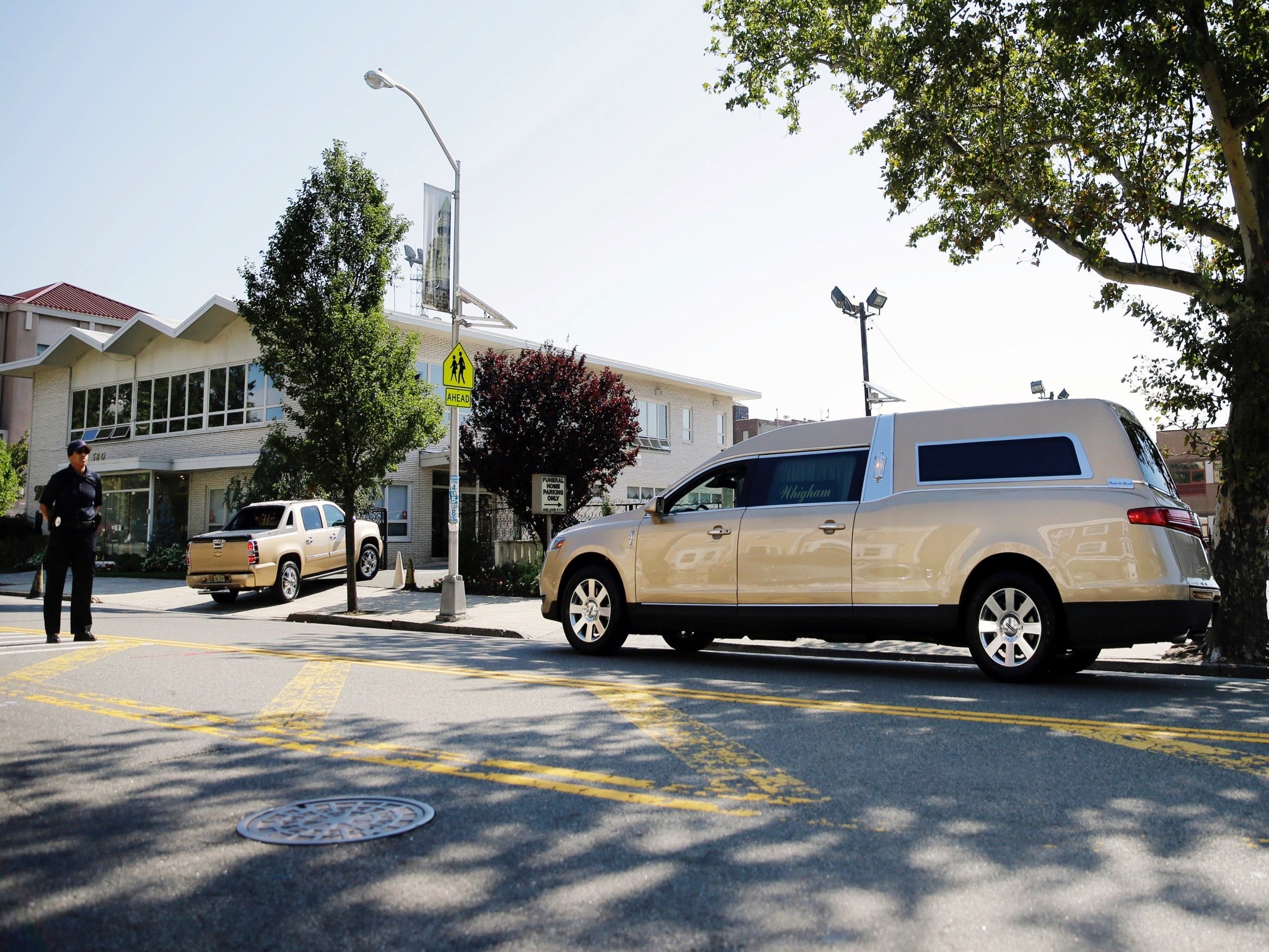 A hearse carrying the body of Bobbie Kristina Brown