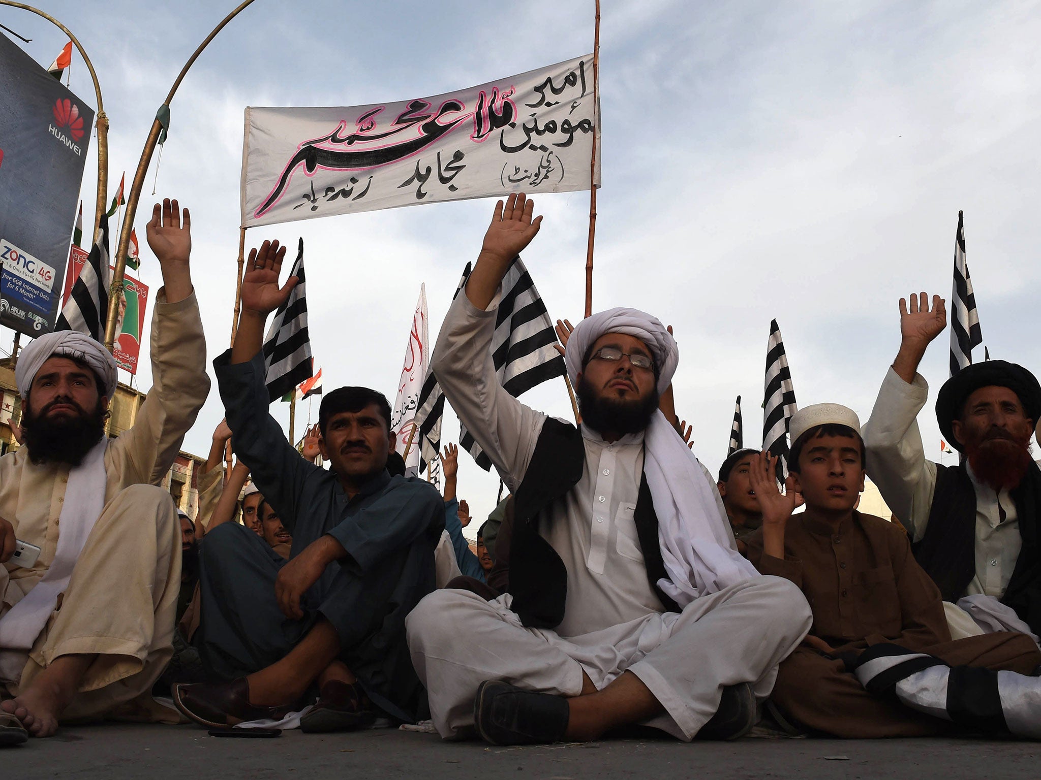 Members of the Afghan Taliban have released a video showing the group pledging allegiance to their new leader, Mullah Akhtar Mansour